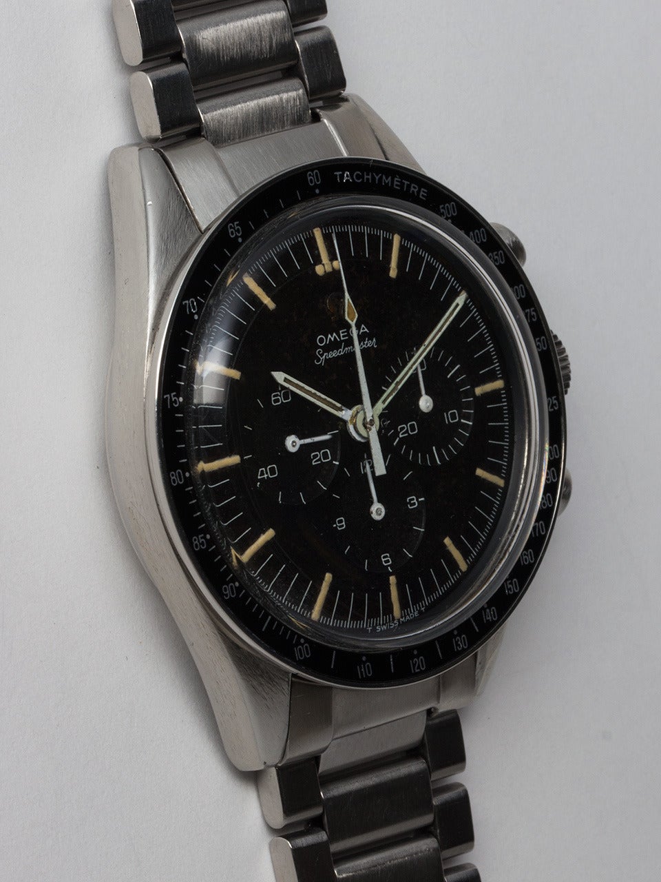 Omega Stainless Steel Non Professional Pre Moon Speedmaster Wristwatch. Ref 105.003-41 serial# 22 million circa 1964. 42mm diameter case with tachometer bezel and black original stepped dial and patina'd hands. Powered by Valjoux 72 3 registers