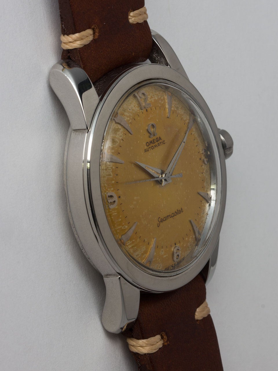 Omega Stainless Steel Seamaster Automatic Wristwatch ref # C2577-9SC movement serial #13.5 million circa 1966. Case measuring 34 x 42mm. Featuring very pleasing original warm golden patina dial with raised tapered indexes and hands. Powered by