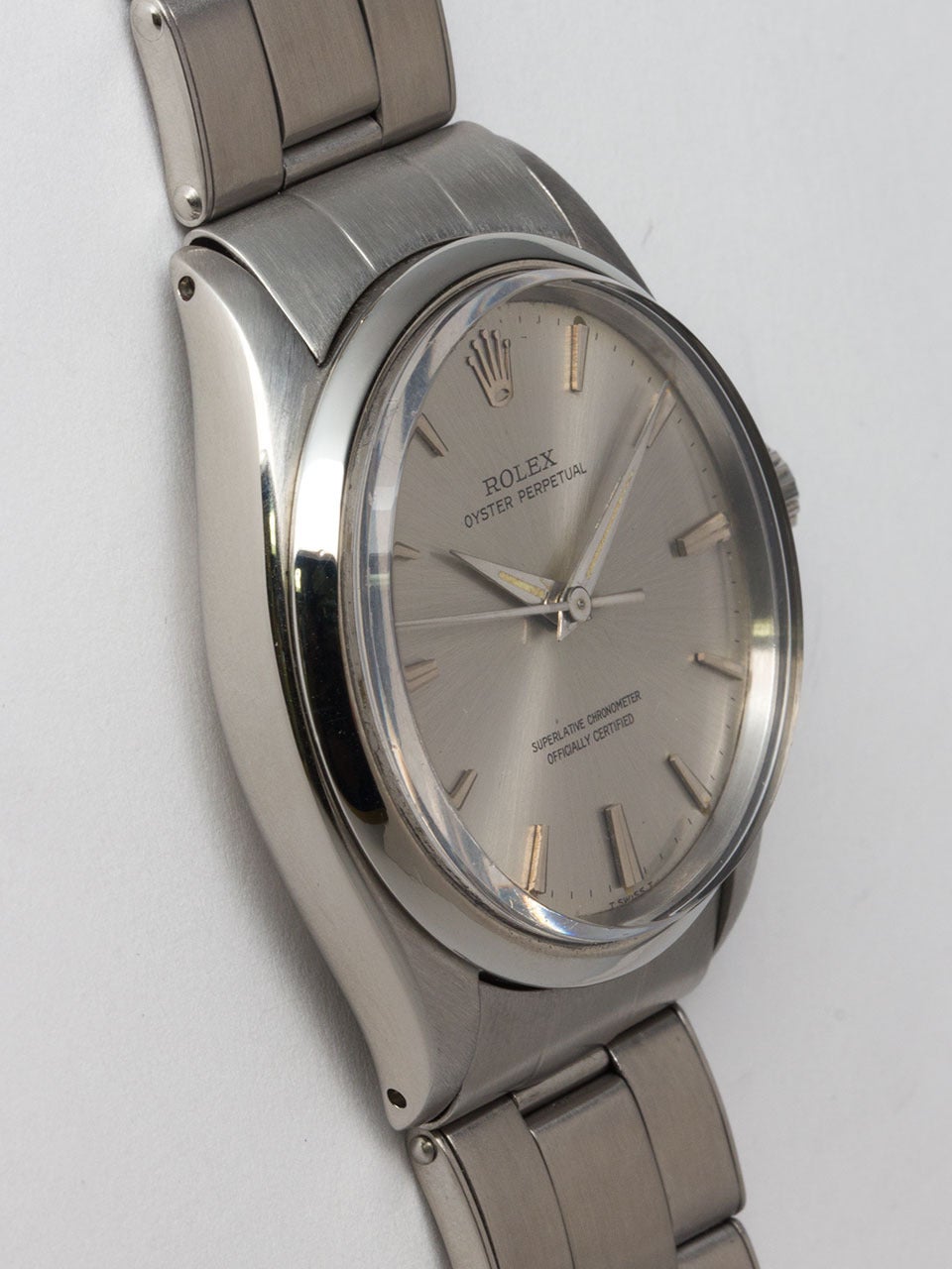 Rolex Stainless Steel Oyster Perpetual Wristwatch ref 1002 serial #1.2 million circa 1965. 34mm diameter case with smooth bezel and acrylic crystal. Very pleasing original silvered satin dial with raised tapered silver indexes and tapered silver
