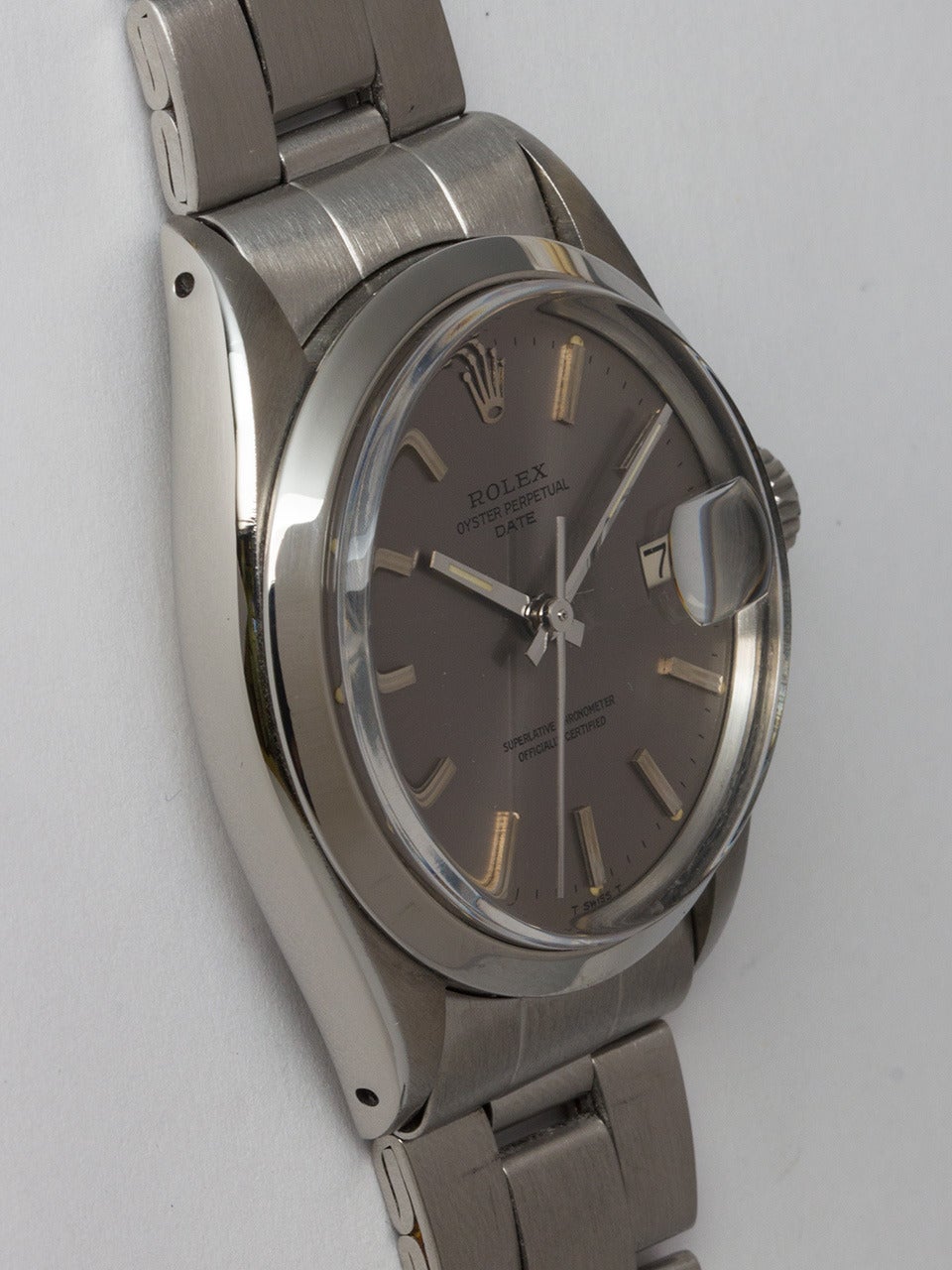 Rolex Stainless Steel Oyster Perpetual Date Wristwatch ref 1500 serial # 3.1 million circa 1972. 34mm diameter case with smooth bezel and acrylic crystal. Unusual original gray dial with applied steel indexes and hands. Self winding caliber 1570