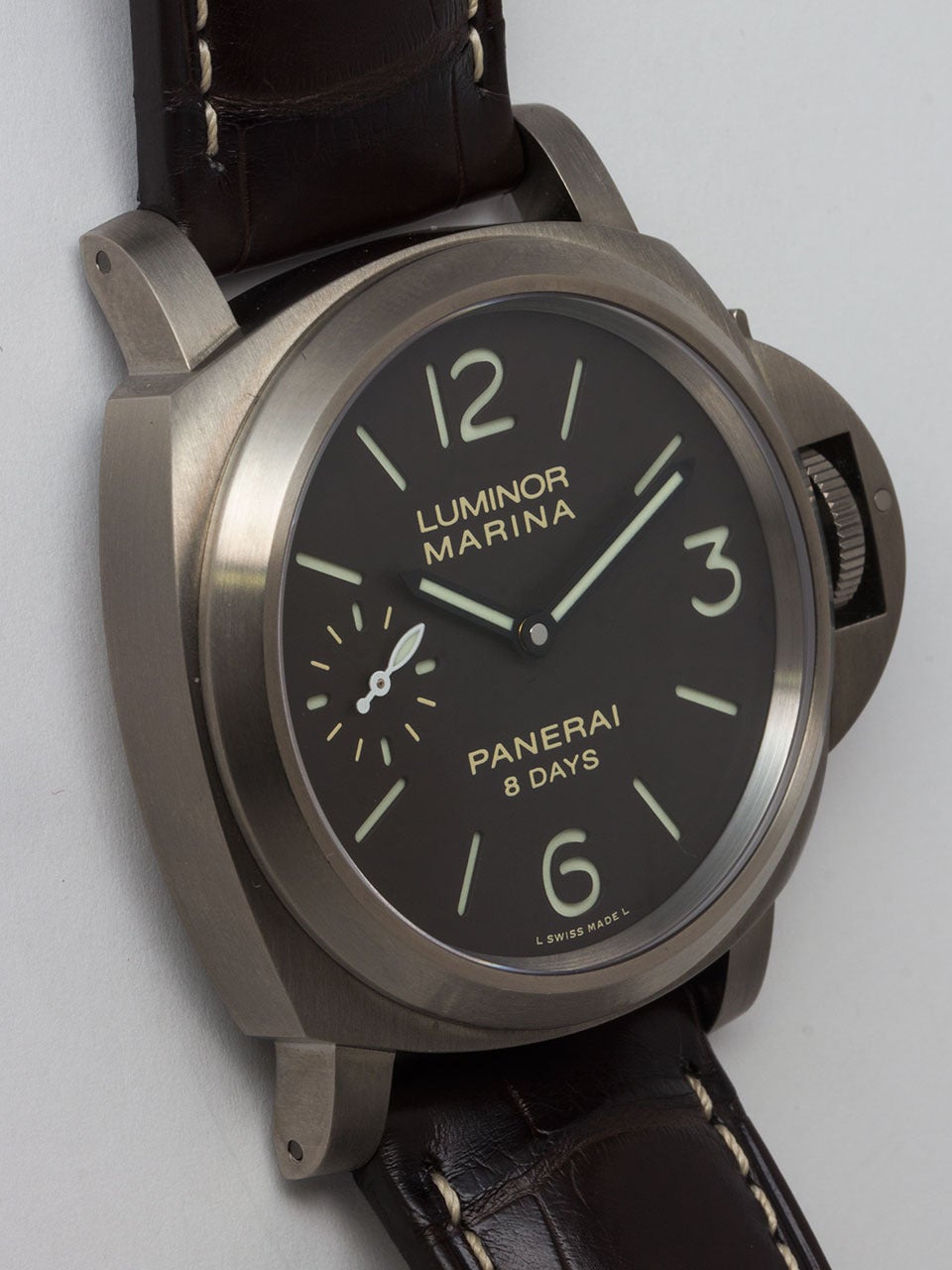 Panerai Titanium Luminor Marina 8 Day Power Reserve Wristwatch PAM 056. Like new condition, pre owned complete with box and papers circa 2013. 44mm diameter case, brown sandwich dial with luminova figures and hands. Sapphire crystal display back