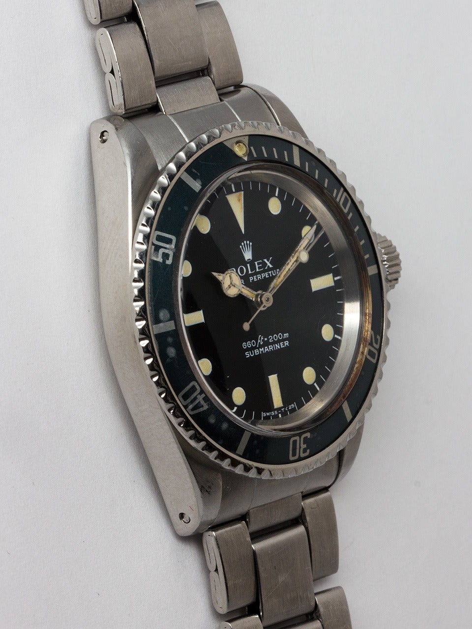 Rolex Stainless Steel Submariner Wristwatch ref 5513 serial #1.4 million circa 1966. 40mm diameter case with bi-directional elapsed time bezel, faded original matte black elapsed time bezel. Original very pleasing condition matte black feet first