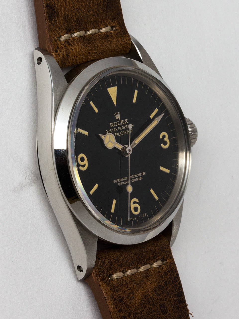 Rolex Stainless Steel Explorer 1 Wristwatch ref 1016, serial # 867,xxx circa 1962. 36mm diameter Oyster case with smooth bezel and acrylic crystal. Glossy black gilt print dial with richly patina'd luminous figures and matching hands. Dial signed
