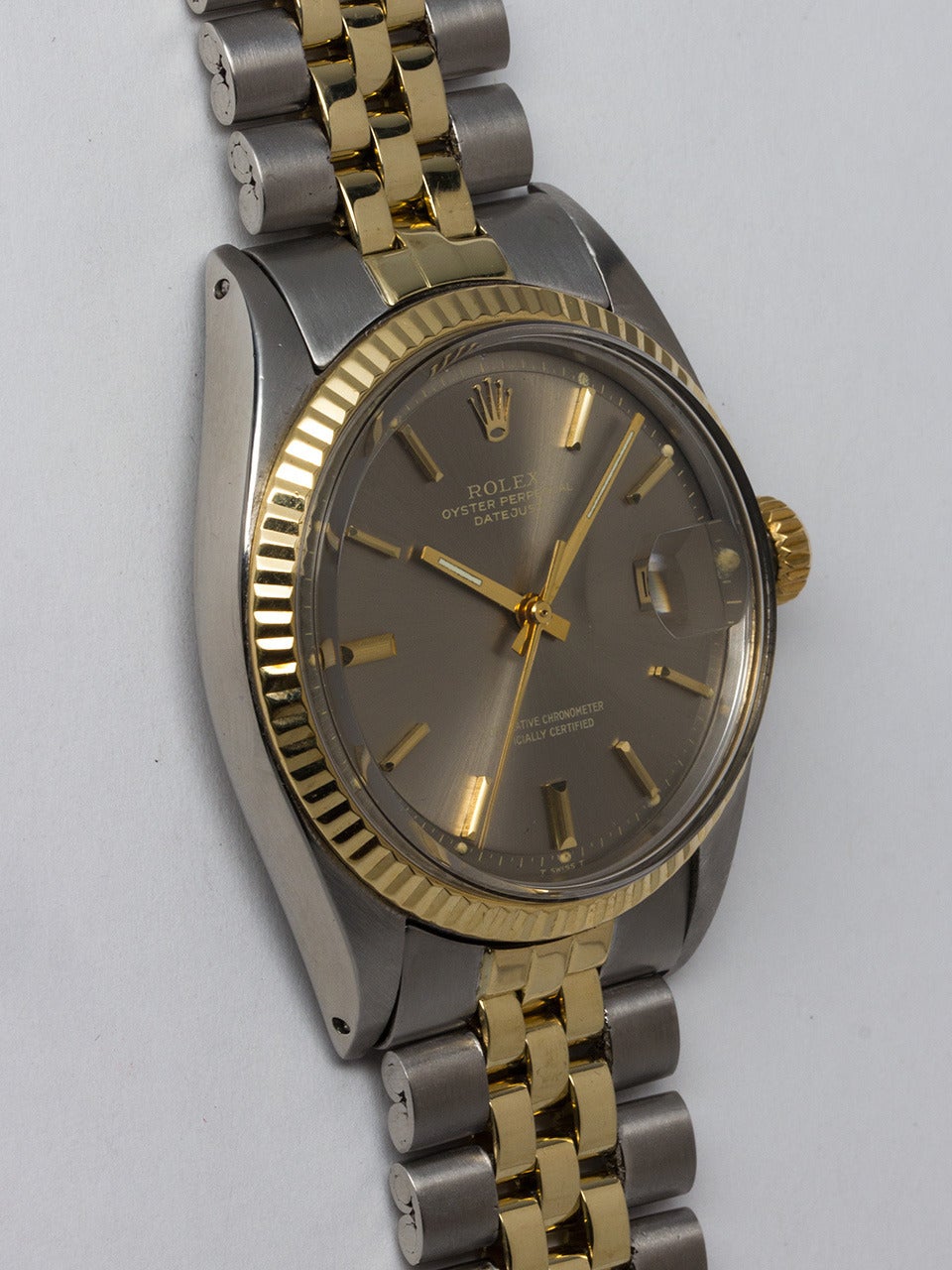 Rolex Stainless Steel and 14K Yellow Gold Datejust Wristwatch ref 1601 serial # 2.8 million circa 1971. 36mm full size man's model with 14K yellow gold fluted bezel and acrylic crystal. Very pleasing original grey pie pan dial with gold applied