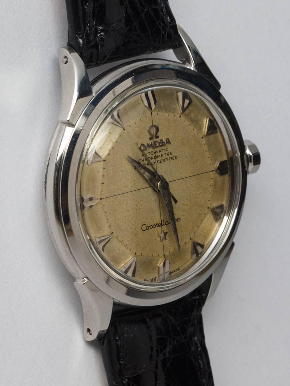 Omega Stainless Steel Constellation ref 2852 circa 1958. 35 x 42mm heavy snap back case with deeply embossed gold Observatory plaque. Pleasing original patina’d matte silvered pie pan dial with large flared silver indexes and tapered silver sword