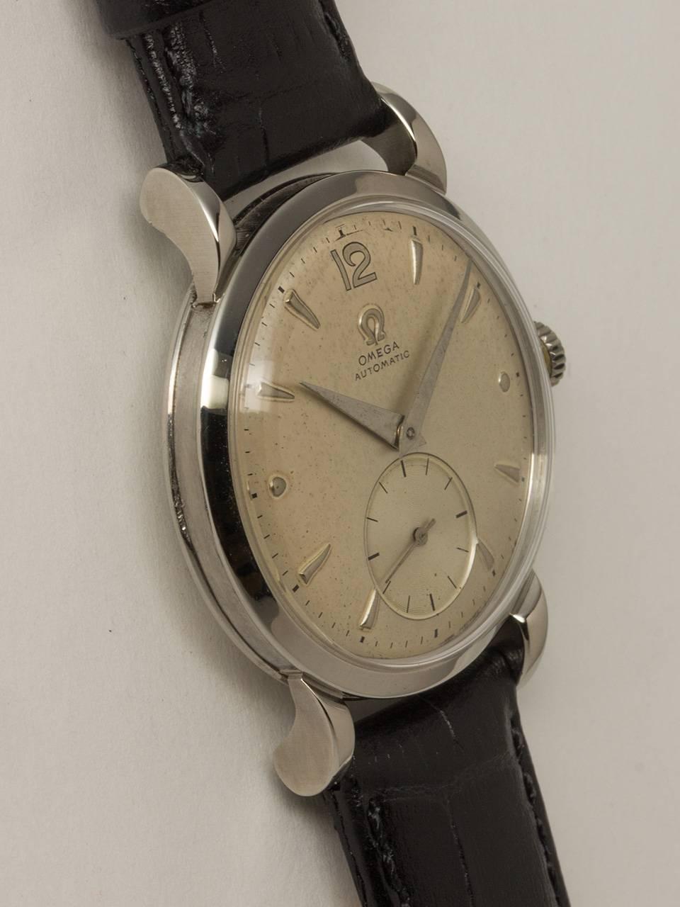 Omega Stainless Steel Automatic Wristwatch ref 2402 movement serial number 11.5 million circa 1950. 33 x 40mm case with tear drop lugs smooth bezel and acrylic crystal. Very pleasing original matte 2 tone silvered dial with raised silver markers and