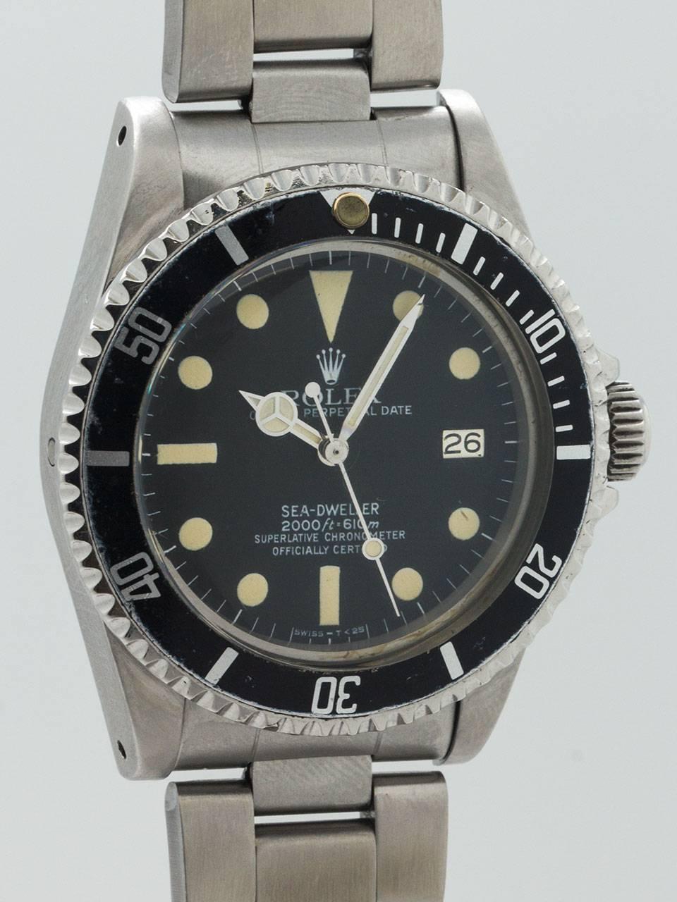 Rolex Stainless Steel “Great White” Seadweller Wristwatch ref 1665 serial number 6.5 million circa 1979 full set with box and papers. From estate, this great looking “Great White” vintage Seadweller is about as complete a set as possible. Original
