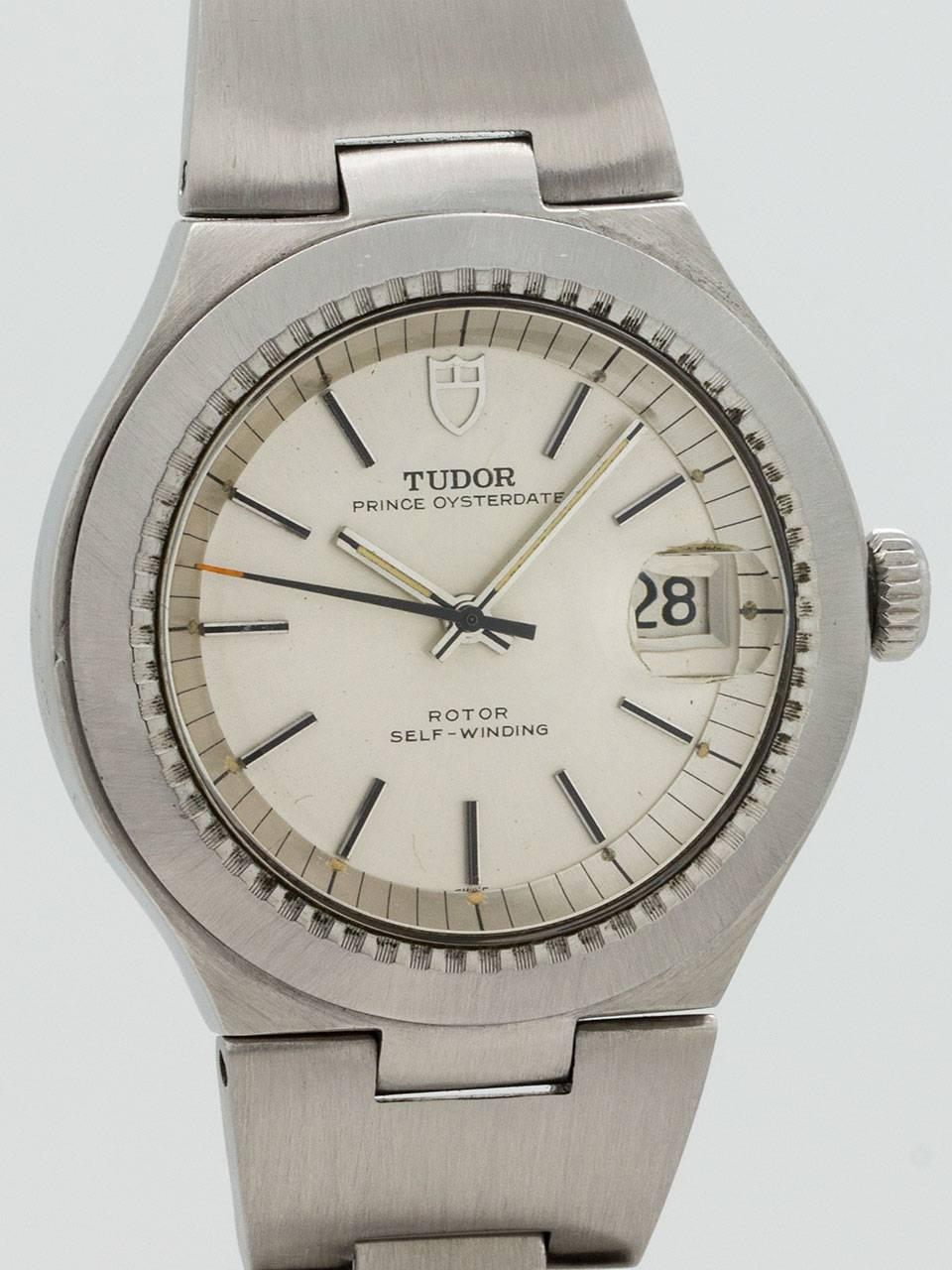 Tudor Prince Oysterdate ref 9101/0 circa 1973. Unusual and cool modern design tonneau shaped Oyster case with screw down Rolex crown, screw down case back, sloped bezel with engine turn inner pattern and acrylic crystal. Original silvered satin dial