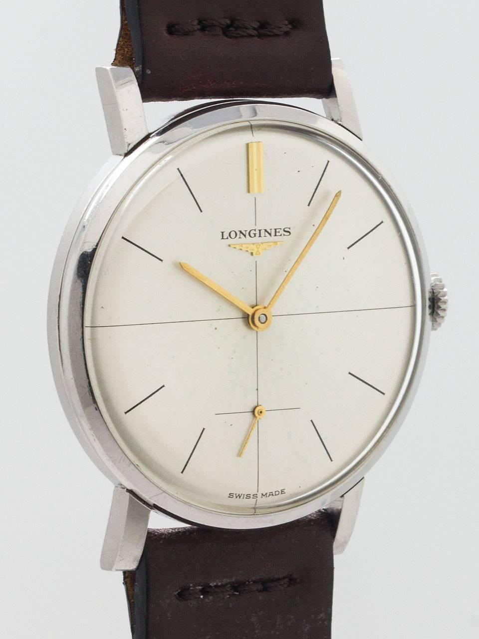Very minty condition vintage Longines Dress Model ref 8903 circa 1960s. Featuring never polished stainless steel 35mm diameter case with snap down back, sloped bezel and straight extended lugs. With mint condition original “post moderne” minimalist