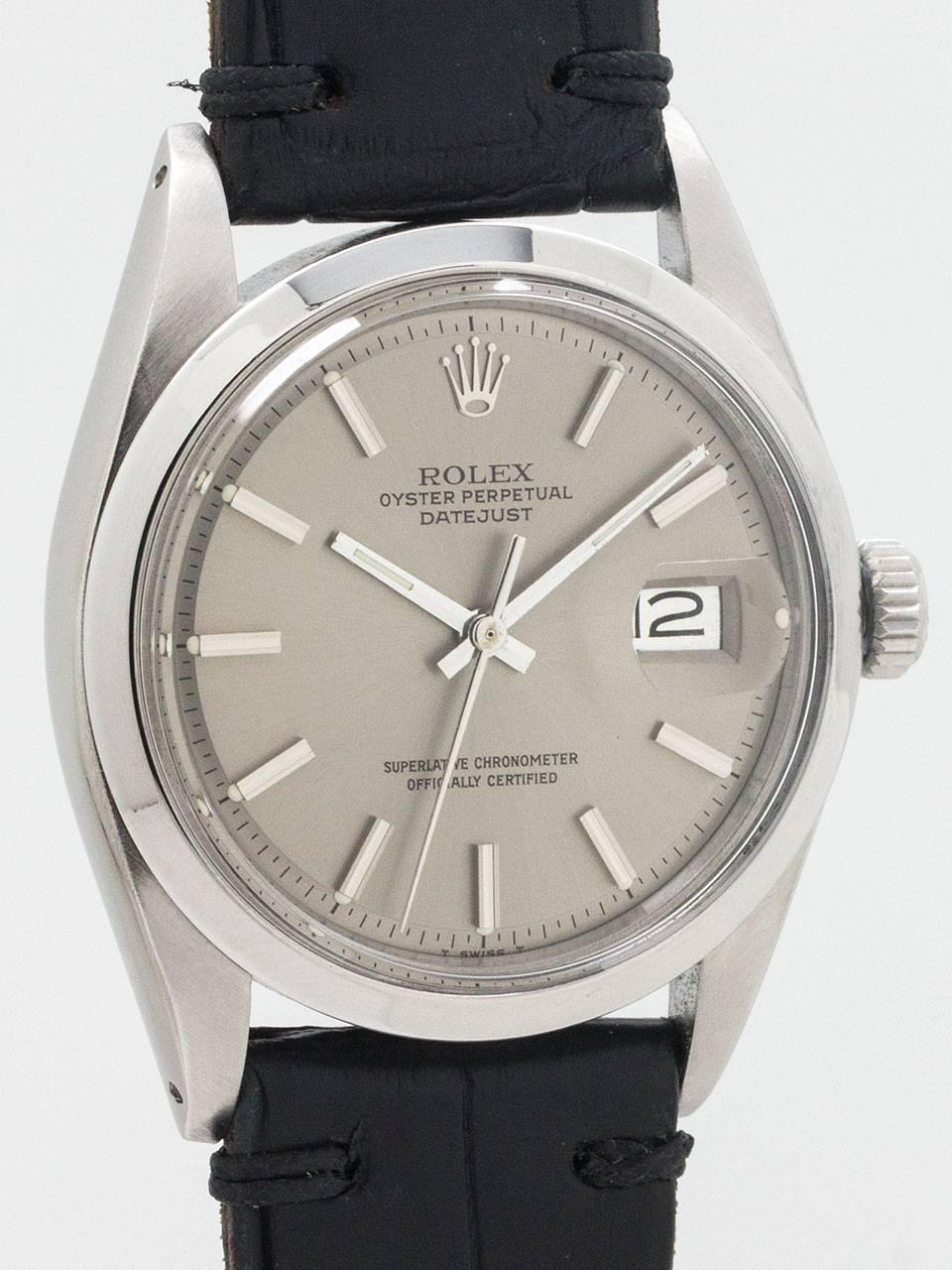 Vintage Rolex Stainless Steel Datejust Wristwatch ref 1600 serial number 3.9 million circa 1974. Featuring 36mm diameter case with smooth bezel, acrylic crystal, and scarce original dark grey pie pan dial with applied silver indexes and silver baton