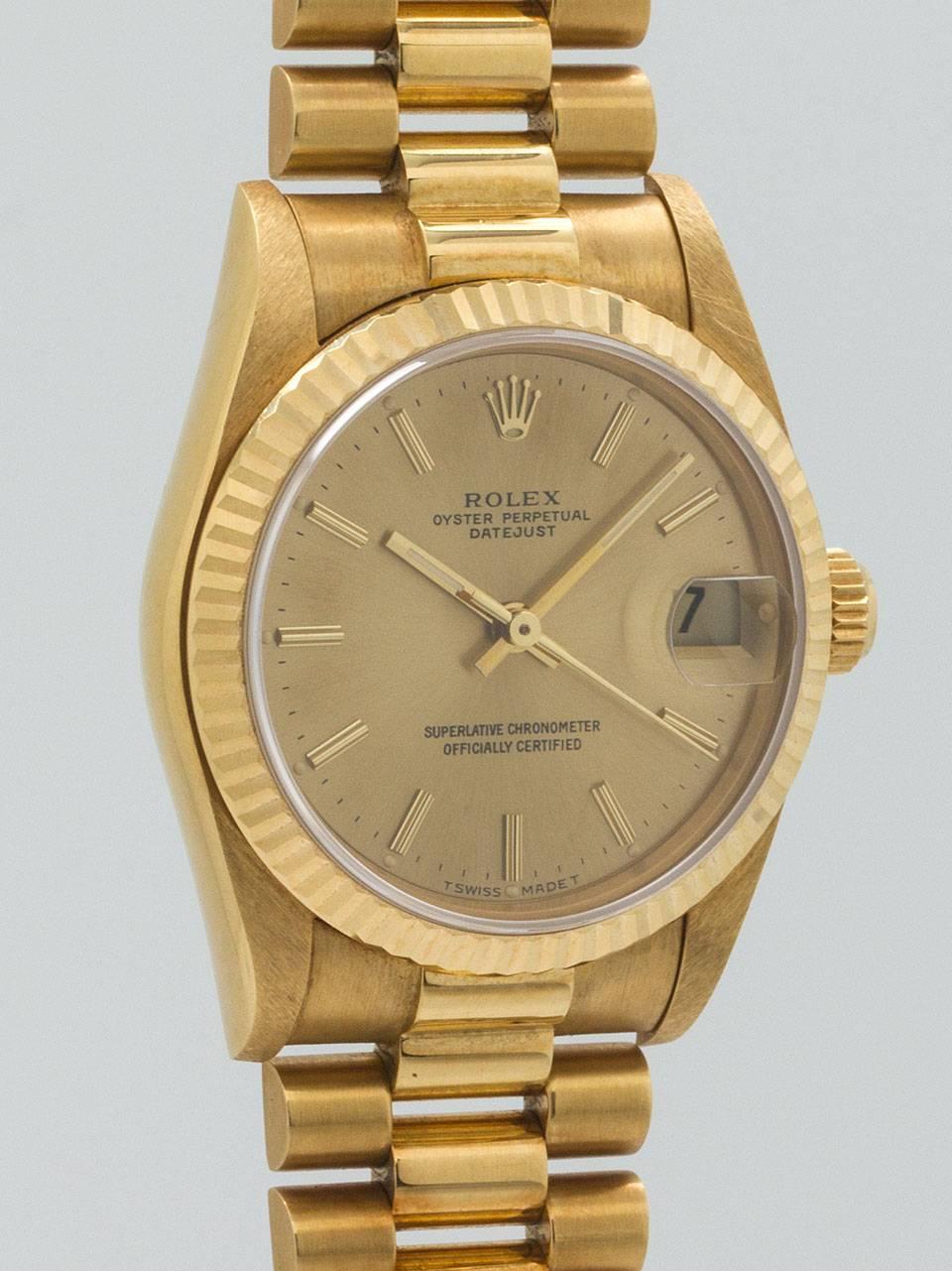 Rolex 18K Yellow Gold Midsize Datejust President ref 68278 serial number R4 circa 1987. Featuring 31mm diameter case with fluted bezel and sapphire crystal. Original champagne dial with gold applied indexes and gold baton hands. Powered by self