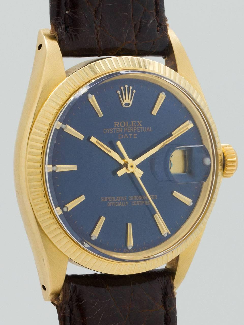 Rolex 14K Yellow Gold Oyster Perpetual Date ref 1503 serial number 2.2 million circa 1969. Featuring 34mm diameter case with fluted bezel and acrylic crystal. Beautiful custom colored “Sapphire Blue” dial with gold applied indexes and gilt hands.