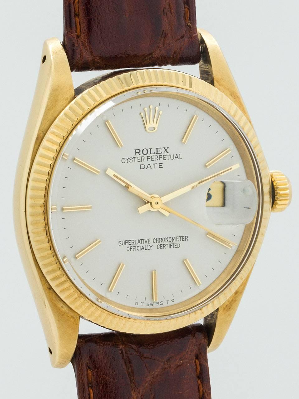 Vintage Rolex Oyster Perpetual Date ref 1503 serial number 3.5 million circa 1973. Featuring 34mm diameter 14K yellow gold case with fine milled bezel and acrylic crystal. Very pleasing restored antique white dial with applied gold indexes and gilt