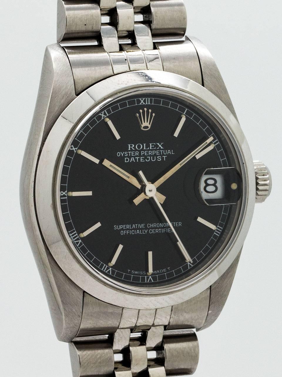 Rolex Stainless Steel Midsize Datejust ref 68240 serial # U9 circa 1997. Featuring 31mm diameter stainless steel case with smooth bezel and sapphire crystal.  Screw down signed Rolex Oyster crown and case back. Glossy black original dial with