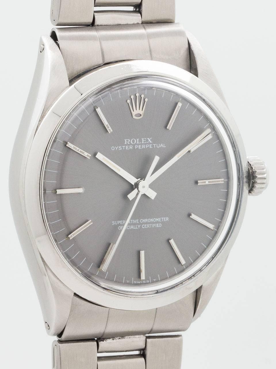 Vintage Rolex Oyster Perpetual ref 1002 serial number 2.1 million circa 1969. Featuring 34mm diameter stainless steel case with smooth bezel and acrylic crystal. Original scarce gray dial with applied silver indexes and silver baton hands. Powered