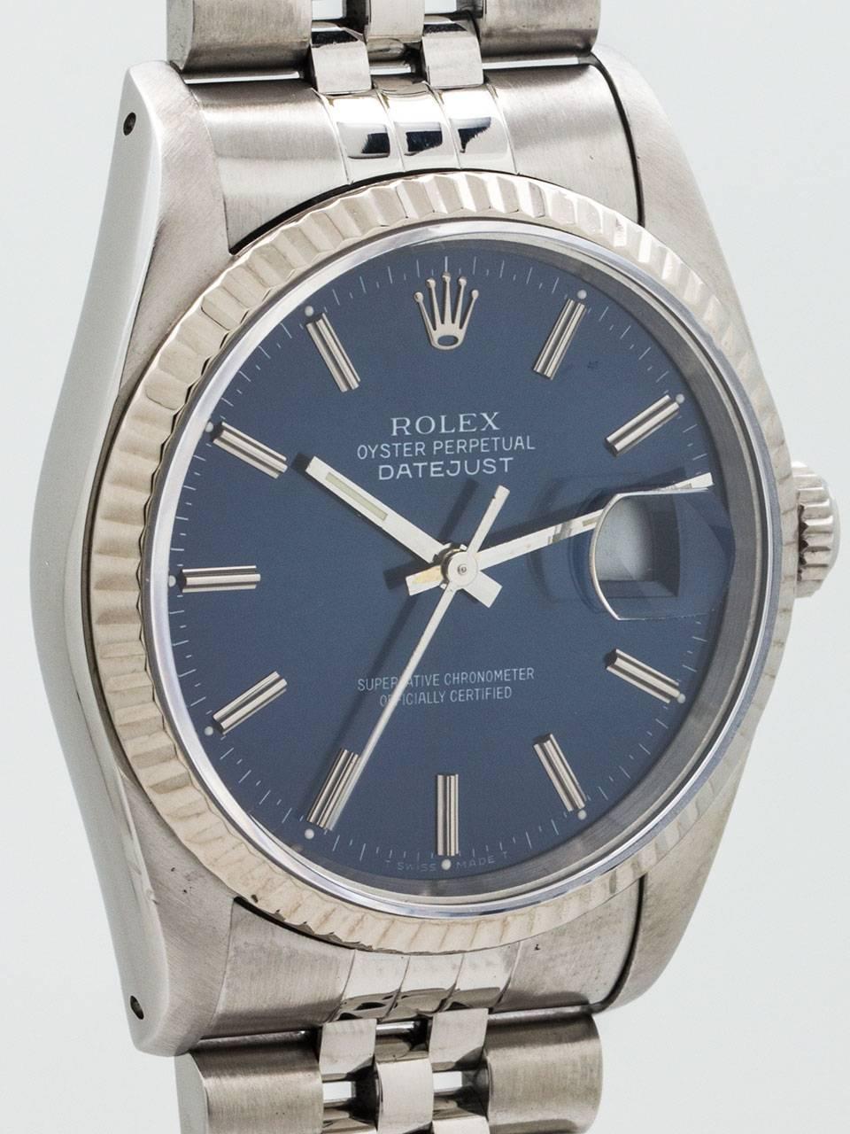 Rolex Datejust ref 16234 serial number  X7 circa 1991. Full size man’s model 36mm diameter stainless steel case with 14K white gold fluted bezel and sapphire crystal. Blue satin dial with applied silver indexes and silver baton hands. Powered by