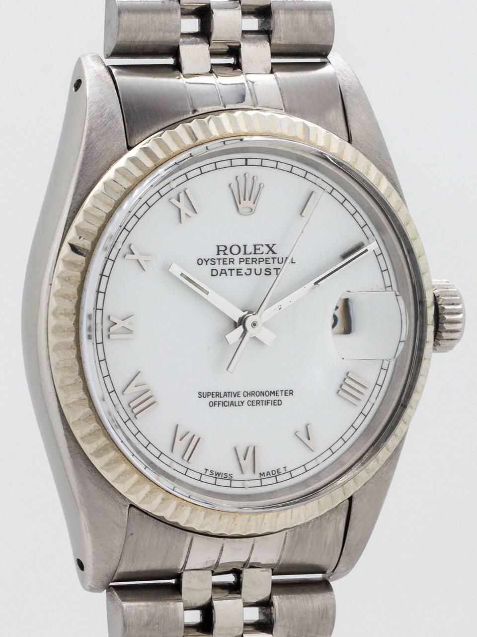 Rolex Stainless Steel Datejust ref 16014 serial number 6.5 million circa 1980. 36mm diameter case with 18K white gold fluted bezel and acrylic crystal. Featuring a white enamel dial with applied silver Roman indexes and silver baton hands. Powered