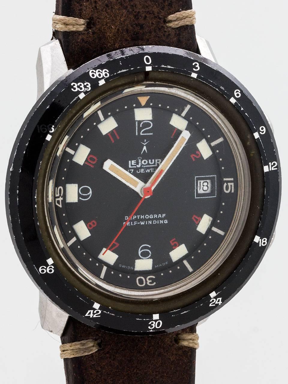 Le Jour Depthograf Diver’s Wristwatch circa 1960s. This watch features an extra large 45mm in diameter and 14mm thick stainless steel case. Lug to lug measurement is 46mm. Featuring a with black painted bezel and screw down case back. Original