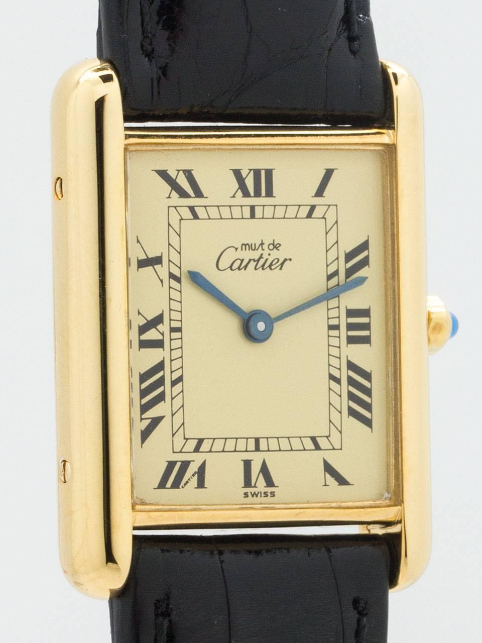 Cartier Man's Vermeil Tank Louis Must de Cartier, circa 2000s. Vermeil, 20 microns gold over silver, 26 x 31mm case secured by four side screws and four back screws. Classic cream color dial with black Roman figures, blued steel hands and signed