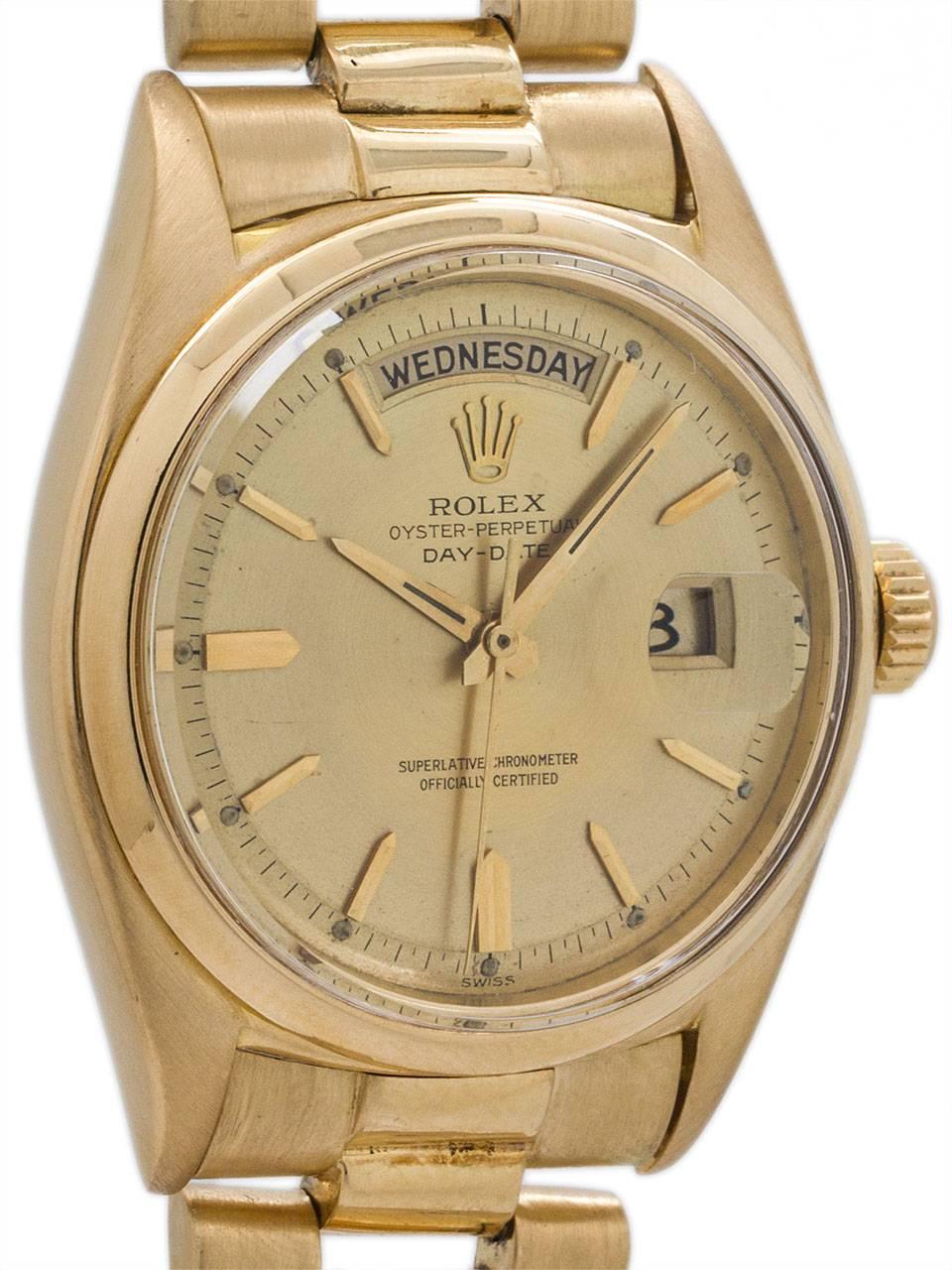 Vintage Rolex Day Date President ref 1802 circa 1963. Featuring 36mm diameter case with defining characteristic smooth bezel of the 1802 ref no. Acrylic crystal and original champagne pie pan dial with applied gold indexes and tapered gilt dauphine