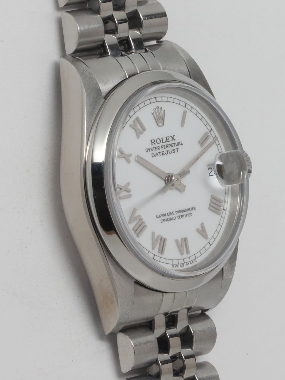 Rolex Stainless Steel Midsize Datejust Wristwatch ref 68240 serial #U5 circa 1997. 31mm diameter case with smooth bezel and sapphire crystal. White dial with applied silver thin Roman numerals and hands. Powered by self winding 2135 caliber movement