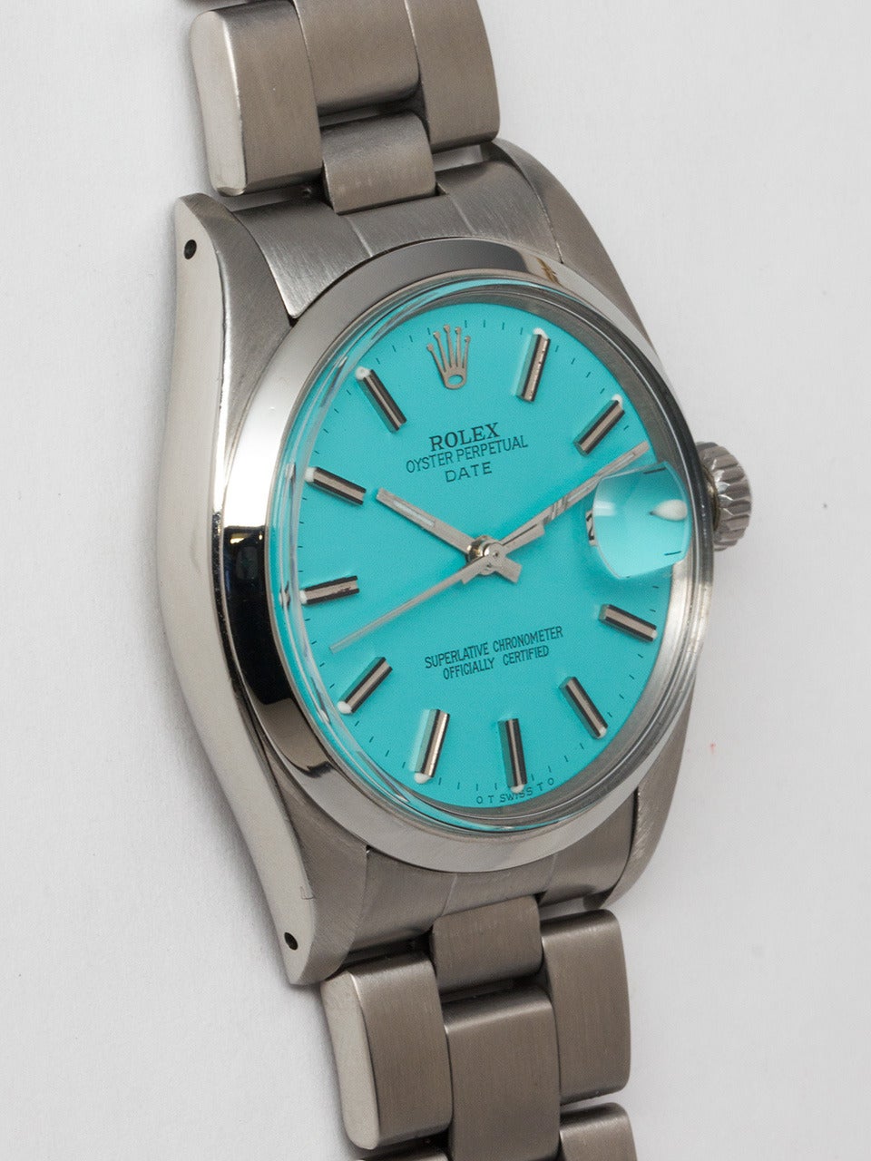 Rolex Stainless Steel Oyster Perpetual Date Wristwatch ref 1500 serial # 3.9 million circa 1975. 34mm diameter case with smooth bezel and acrylic crystal. Beautiful custom colored Tiffany Blue dial with applied silver indexes and silver baton hands.