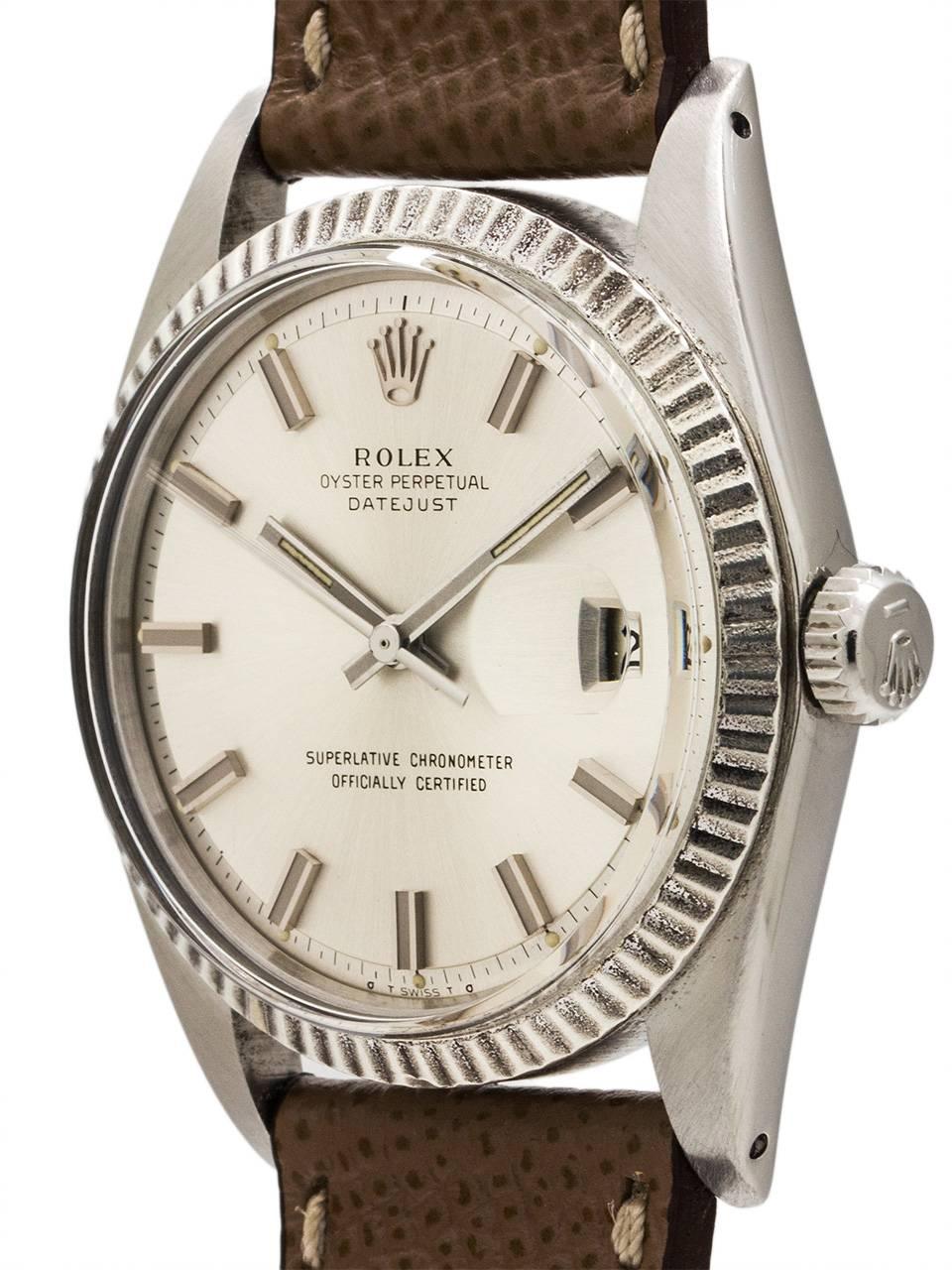 
Vintage man’s Rolex stainless steel Datejust ref# 1601 with serial number 3.8 million, circa 1974. Featuring a 36mm diameter Oyster case with 18K WG fluted bezel, acrylic crystal and signed Rolex crown. Featuring a lovely original silvered satin