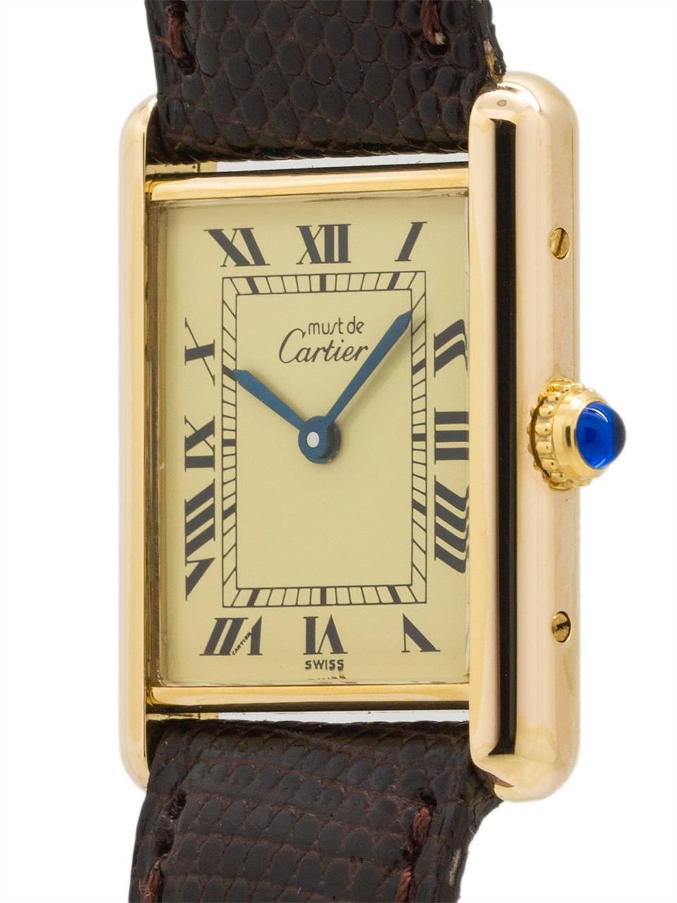 
Cartier Man's Tank Louis circa 1990s. Featuring 24 x 30mm vermeil (20 microns gold over silver) case secured by 4 case back screws. Featuring classic cream color dial signed Must de Cartier with printed black Roman numerals and blued steel hands.