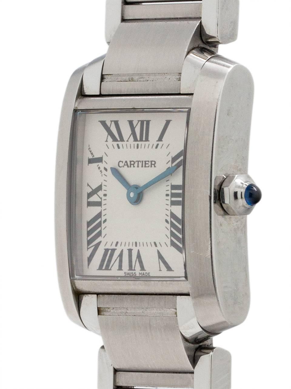 
Cartier Stainless Steel Lady Tank Francaise ref 2384 serial 783329UF circa 2000's. 20 X 25mm case with sapphire crystal and blue sapphire cabochon crown. Classic antique white dial with Roman numerals and blue steel hands. Powered by battery quartz