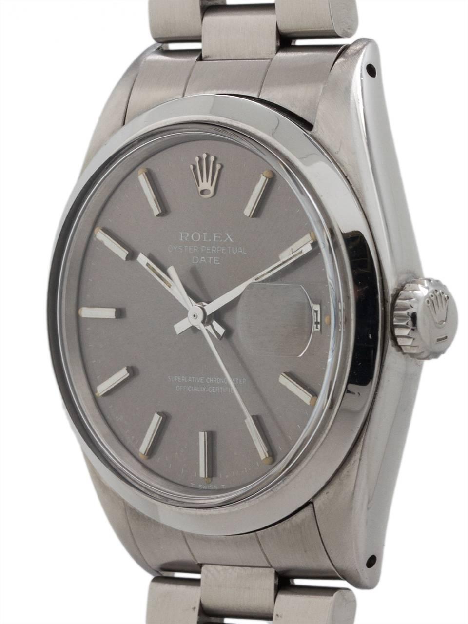 
Rolex Oyster Perpetual Date ref 1500 serial # 2.3 million circa 1969. Featuring 34mm diameter stainless steel case with smooth bezel and acrylic crystal. With scarce original gray dial with applied silver indexes and silver baton hands.. Powered by
