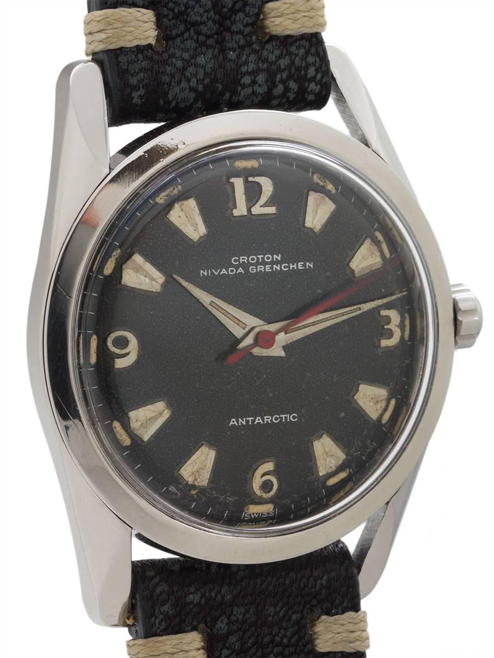 Croton Stainless Steel Antarctic circa 1960’s. 34mm diameter case with screw down back, long 3 sided lugs, and smooth stainless steel bezel. Very pleasing original black patinated dial, luminous dauphine hour and minute hands, and a red seconds