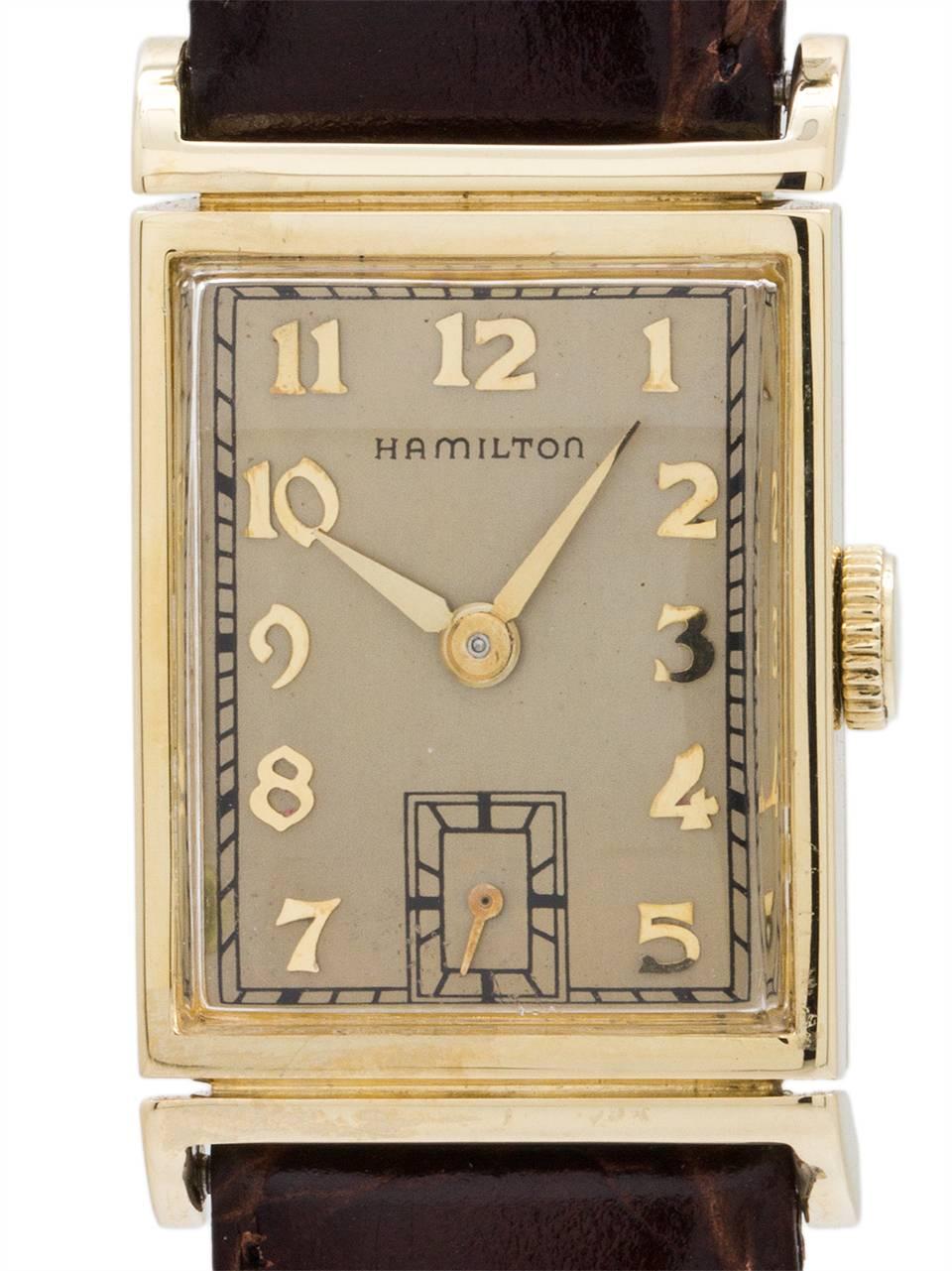 Vintage man’s Hamilton 14K YG “Gilbert” model with personalized case back engraving dating this example to 1948.  Featuring an original “Butler” silvered dial with applied 18K YG Breguet style indexes and tapered gilt hands. Powered by 17 jewel