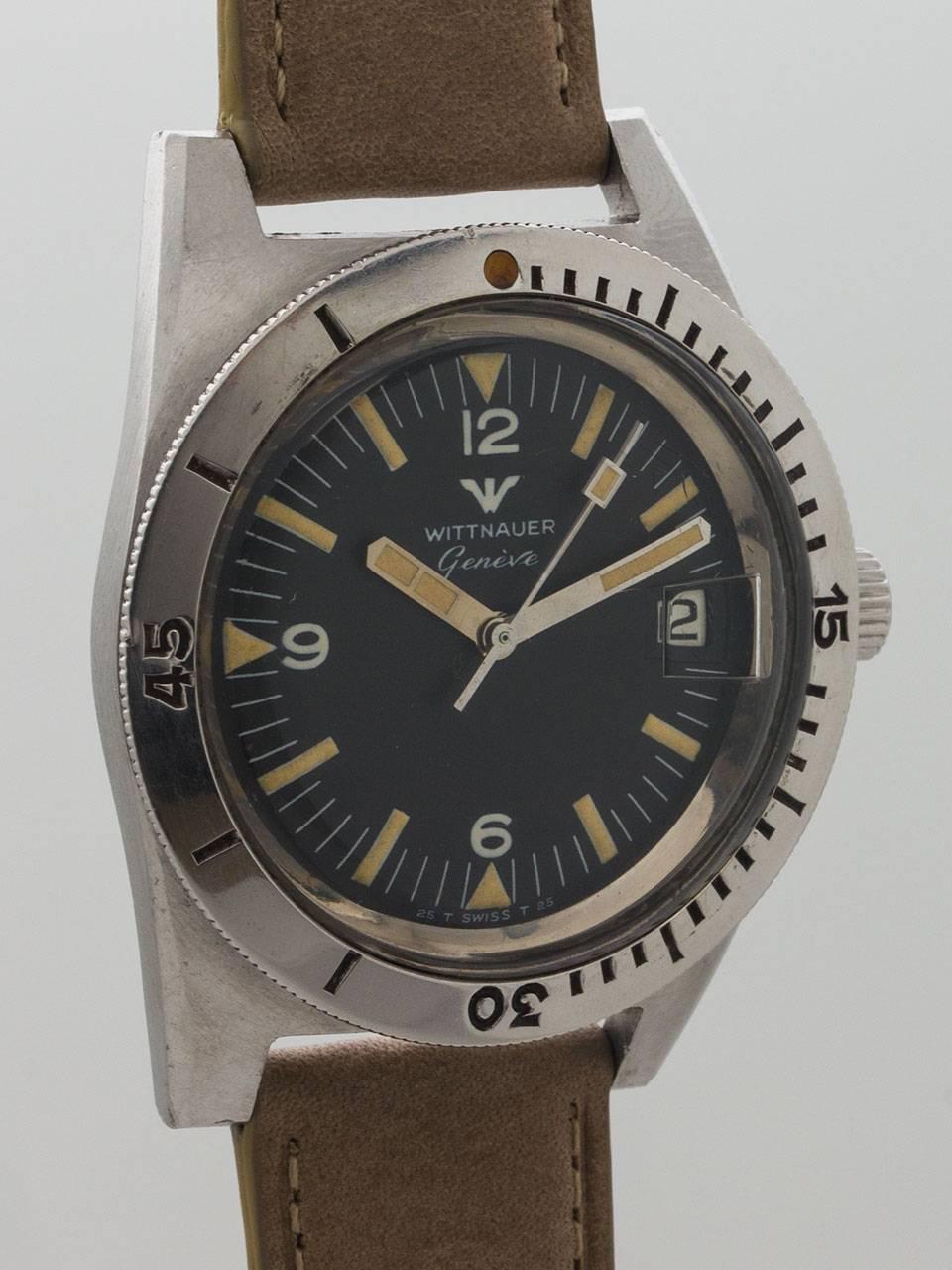 
Wittnauer Stainless Steel Diver’s circa 1960’s.  39 x 47mm case with screw down back and wide elapsed time bezel with acrylic crystal. Original matte black dial with original luminous Arabic & baton indexes and large matching luminous