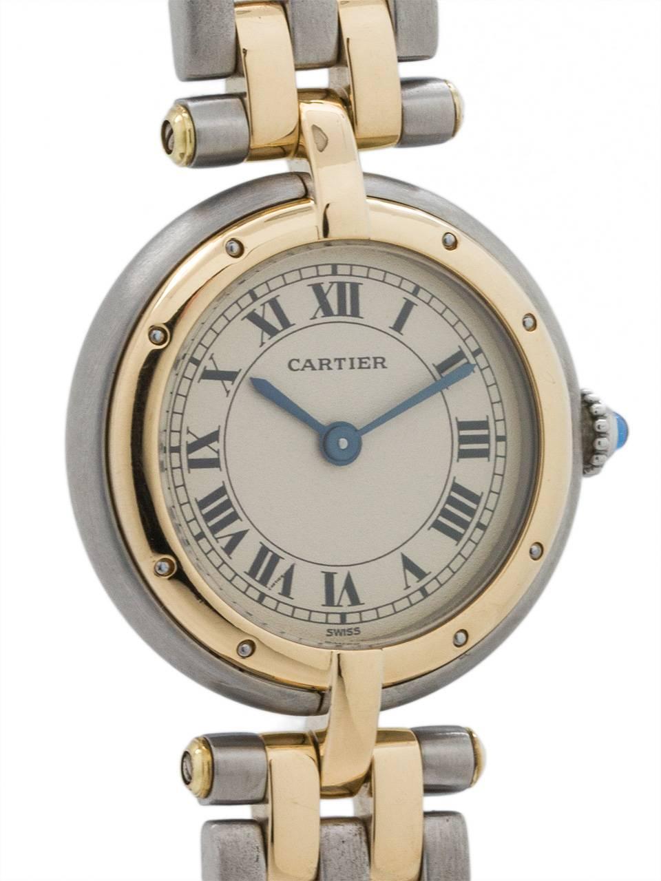 
Cartier lady’s Vendome Panther SS/18K YG circa 2000’s. Featuring 23mm diameter case with gold bezel and t-bar lug, steel case body, sapphire crystal, Cartier blue cabochon crown, and with Panther bracelet with 3 stainless steel and 2 18K YG rows of