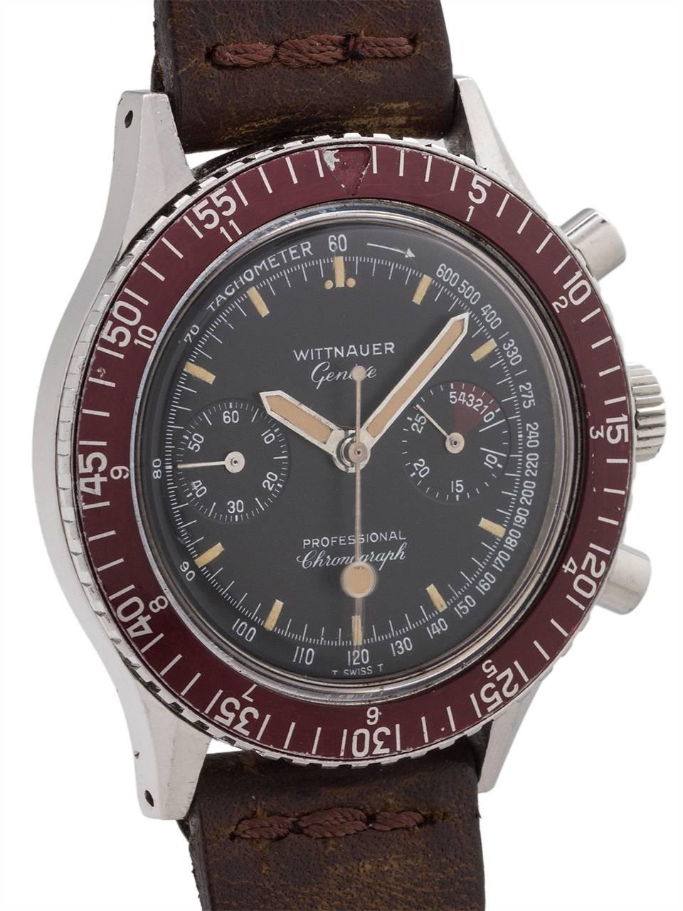 
Wittnauer stainless steel large 2 registers manual wind chronograph ref 7004A circa 1960’s. Featuring large 41 X 47mm case with screw down back, with burgundy elapsed time bezel, acrylic crystal, round chronograph pushers, and very pleasing black