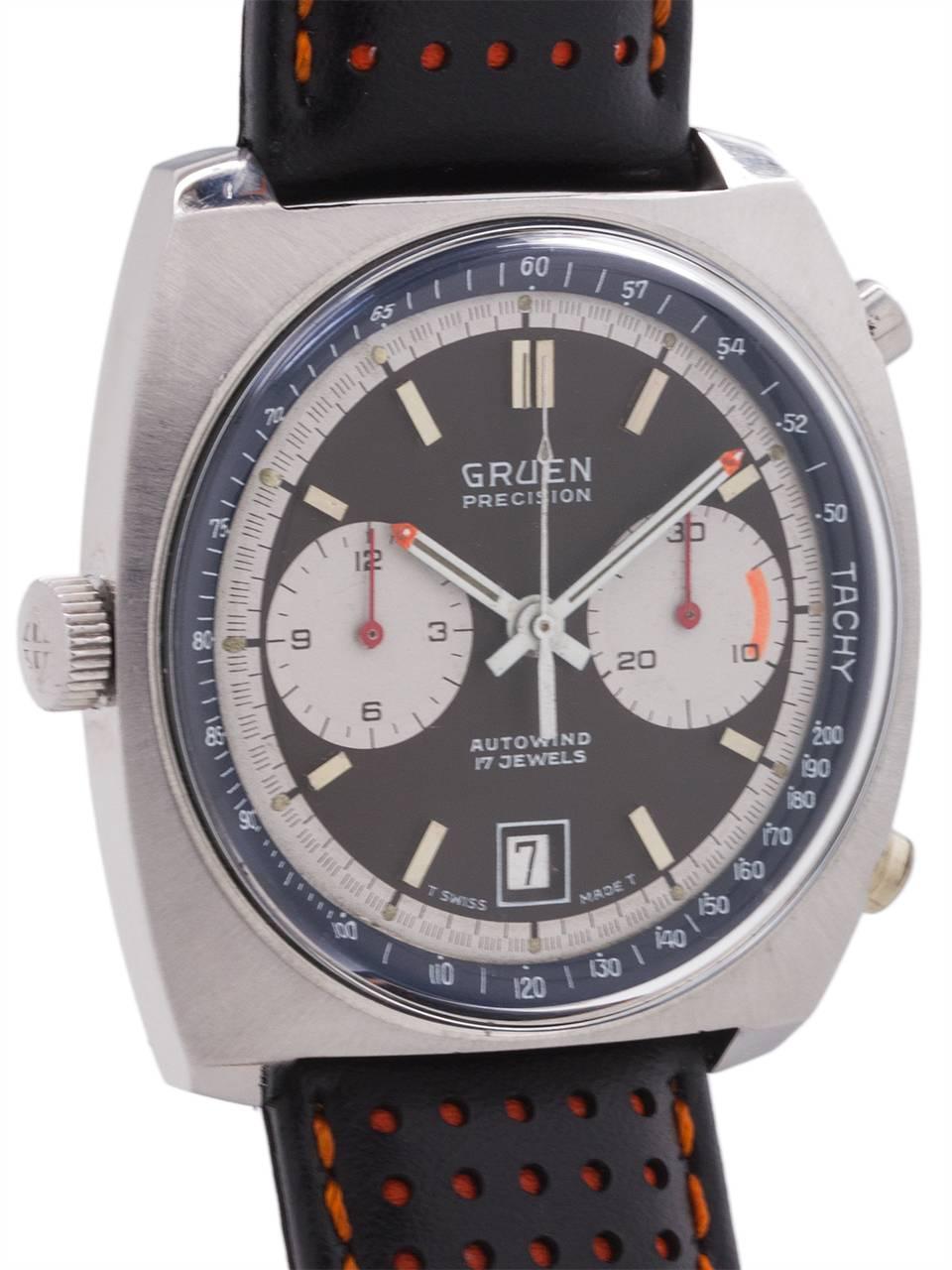 
Gruen “Autavia” style automatic chronograph circa 1970’s. Featuring 40mm diameter cushion shaped case. Featuring a colorful black original dial with over sized white registers, applied silver indexes, white outer track, and sloped contrasting