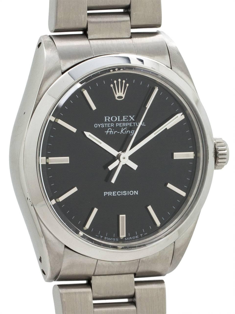
Rolex Oyster Perpetual Airking ref 5500 8.1 million serial # circa 1984. Featuring 34mm diameter Oyster case with smooth bezel, acrylic crystal, and beautiful condition original gloss black dial with applied silver indexes and silver baton hands.