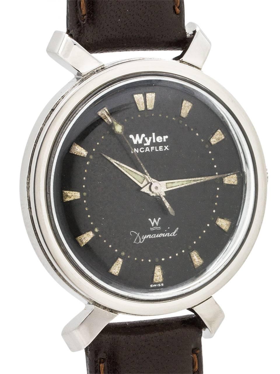 
Man’s modernist design Swiss Wyler wristwatch circa 1960’s. Referred to as a “bowtie” case, this very cool looking model features a 34mm diameter case with offset and angled wide lugs resembling a bow or bowtie. Patina’d surface, black original