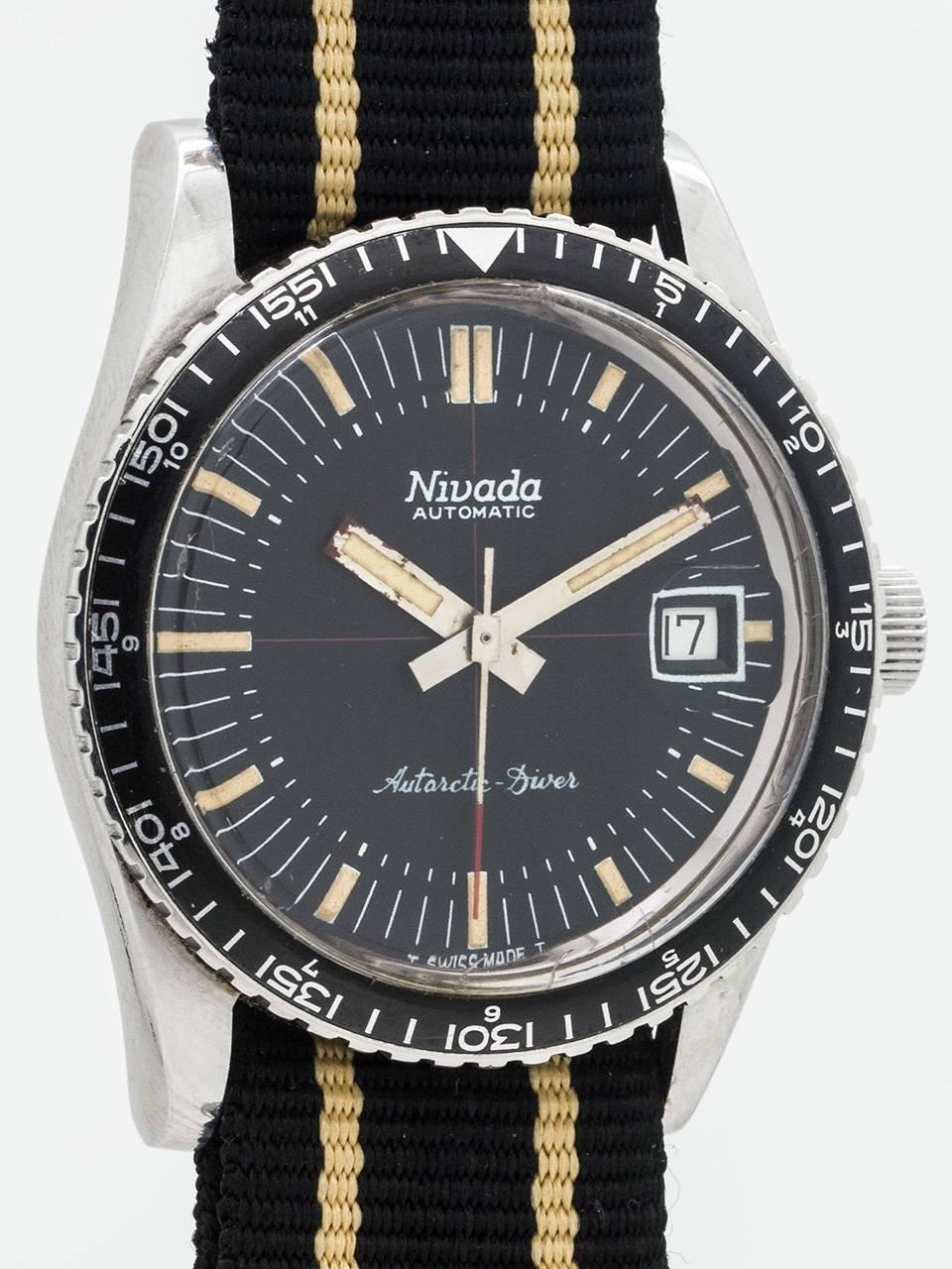 
Vintage Nivada Grenchen “Antarctic” diver’s model circa 1960’s. Featuring 35mm diameter screw back case with fine elapsed time bezel with indications for elapsed time and for 24 hour (2nd time zone). With original acrylic crystal with reverse