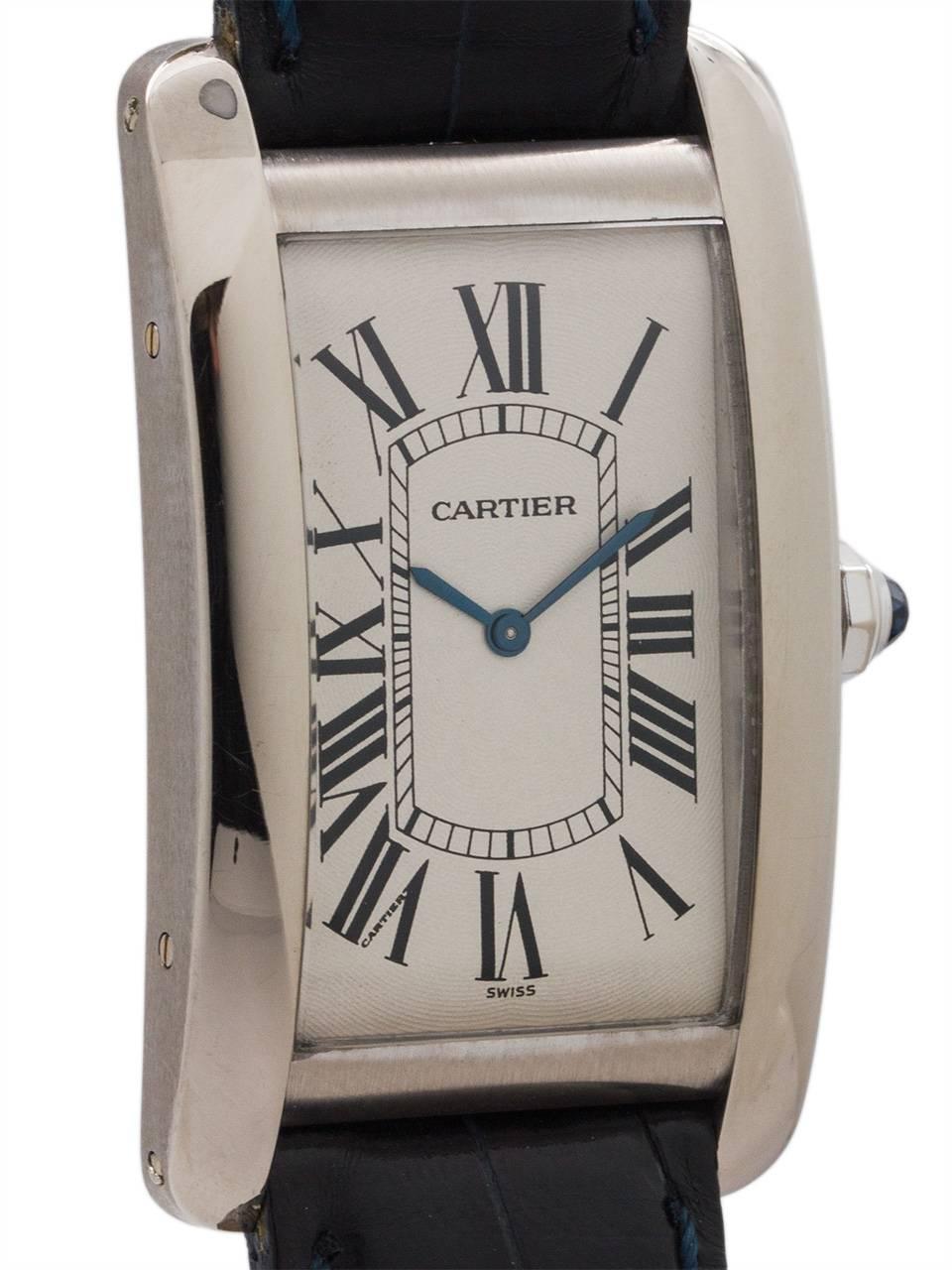 
Man’s large size Cartier Tank American (Americaine) 18K WG circa 1990’s. Featuring oversize 28 x 46mm case with wide polished bezel, curved sapphire crystal, original antique white dial with classic oversize Roman numerals, and powered by 17 jewel