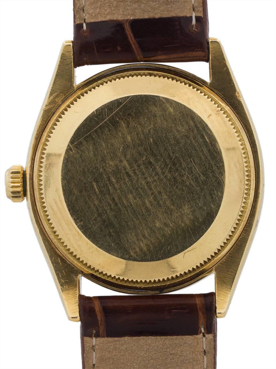 Men's Rolex Yellow Gold Oyster Perpetual Self Winding Wristwatch Ref 6569, circa 1956