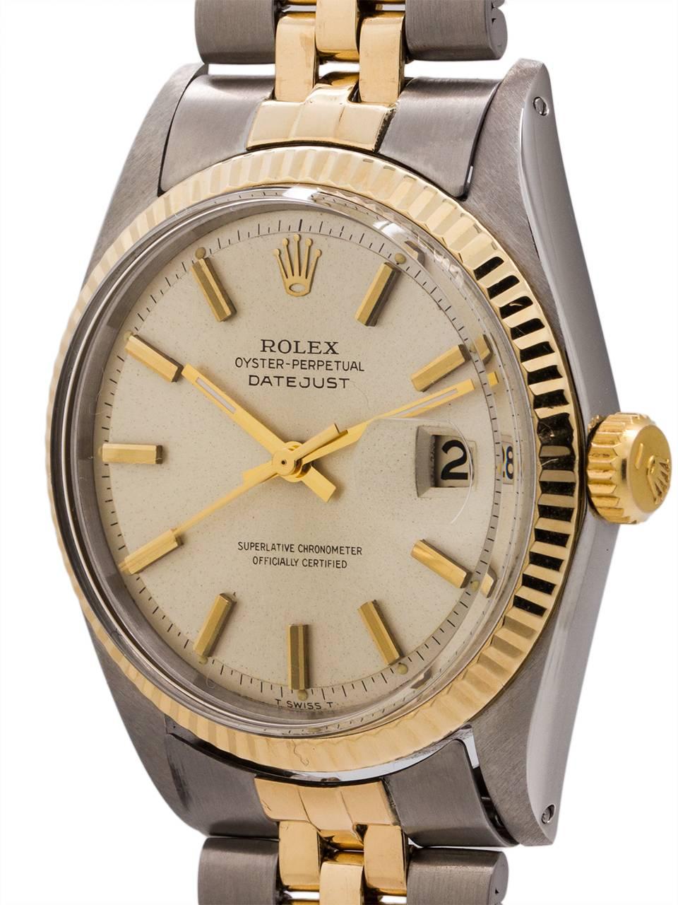 Rolex stainless steel and 14K yellow gold Oyster Perpetual Datejust ref# 1601 circa 1965. Man's full size dress model 36mm diameter Oyster case with 14K yellow gold fluted bezel, signed screw down crown and acrylic crystal. With an absolutely mint
