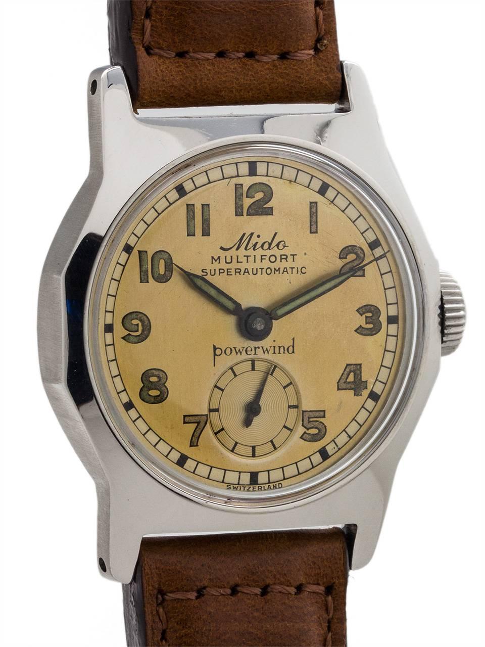 
Great condition example vintage Mido Multifort automatic circa 1950’s. Featuring medium size 30mm diameter cushion shaped case with extend lugs, beautiful condition original 2 tone warmly patina’d dial with radium luminous numbers and hands, with