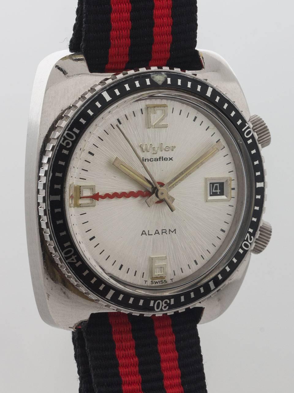 
Wyler stainless steel Alarm, in near new old stock condition with great looking “modern” graphics. Circa 1960’s 36 x 40mm cushion shaped case with screw down back, dual crowns and black elapsed time bezel. Beautiful condition white original dial