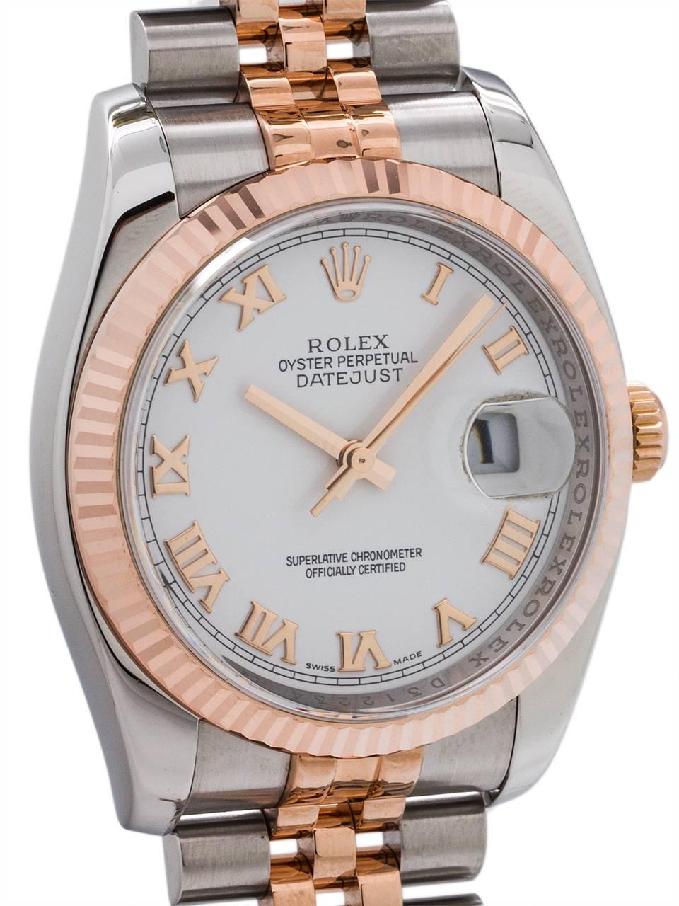 
Recent production model Rolex Datejust ref # 116231, D serial# circa 2005 in very minty preowned condition. Featuring the classic 36mm diameter, but with a modern robust case with 18K RG fluted bezel, sapphire crystal, beautiful original white dial