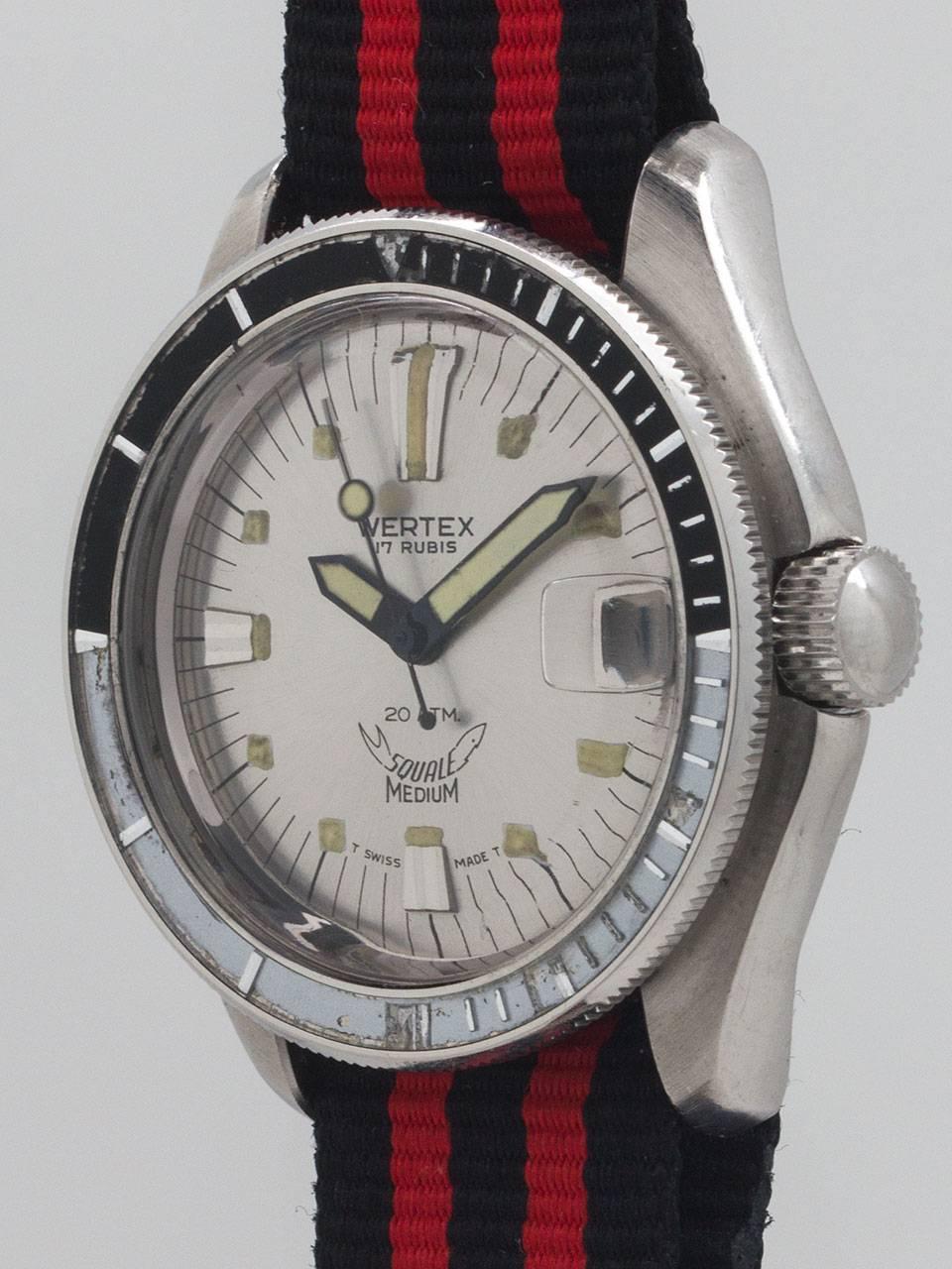 
Wertex Squale Swiss Diver’s circa 1960s. Featuring 35 X 40mm screw back case, acrylic crystal, black and white bakelite elapsed time bezel, and great looking original white “radius”  dial with luminous indexes and oversized luminous hands. Powered