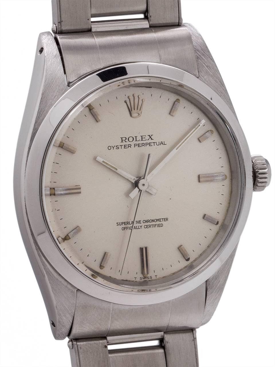 
Rolex Oyster Perpetual ref# 1018, serial #1.7 million, circa 1968. Featuring a 36mm diameter case with smooth bezel and acrylic crystal. Signed Rolex Oyster screw down crown and case back. Featuring very pleasing original silvered satin dial with