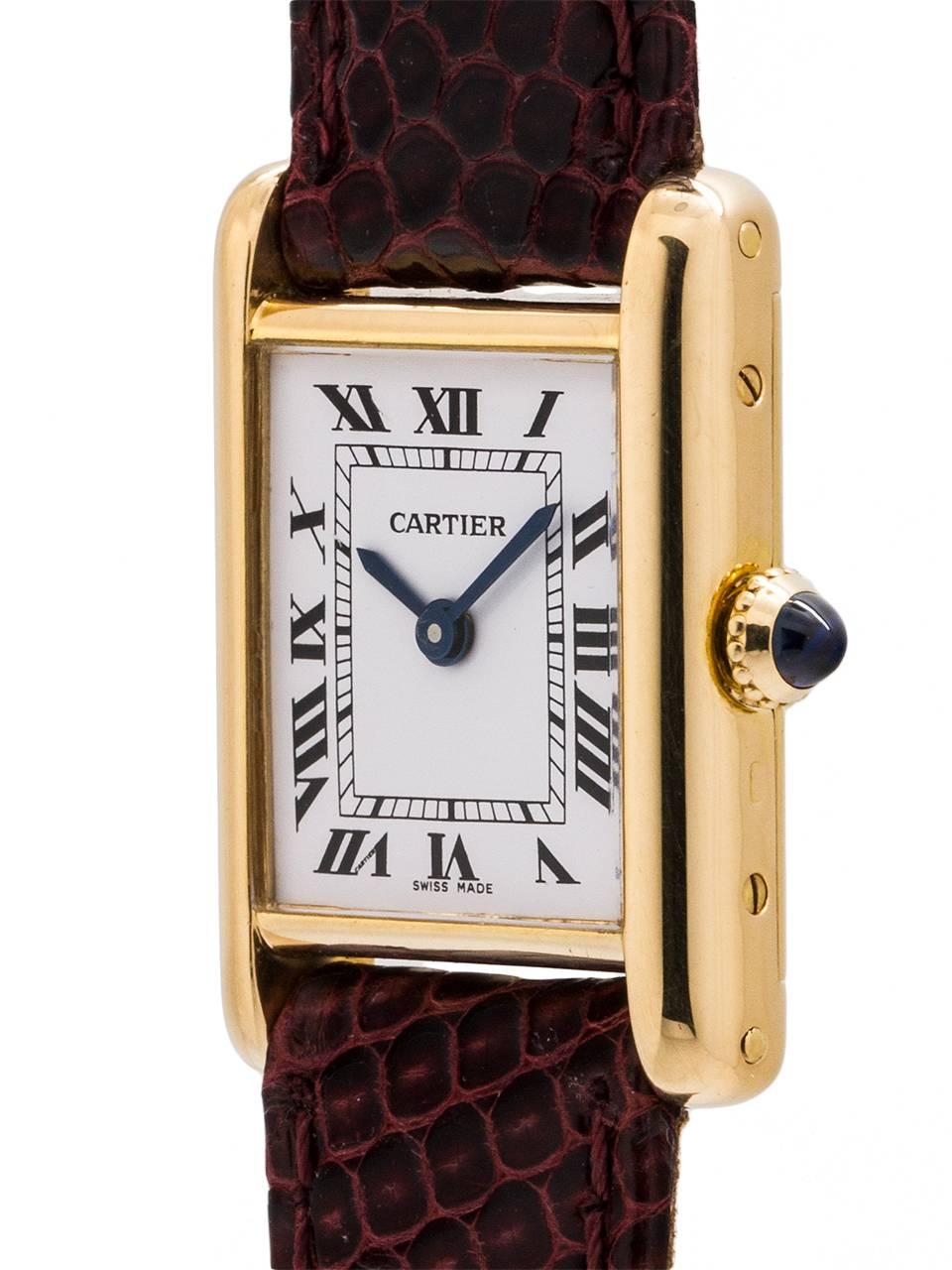 
Cartier Lady’s 18K gold Tank Louis circa 1970’s. Featuring 20.5 X 28mm case secured by 4 screws. Classic early silvered and finely grained original dial signed Cartier with black roman numerals and blued steel hands and signed SWISS. Powered by 17