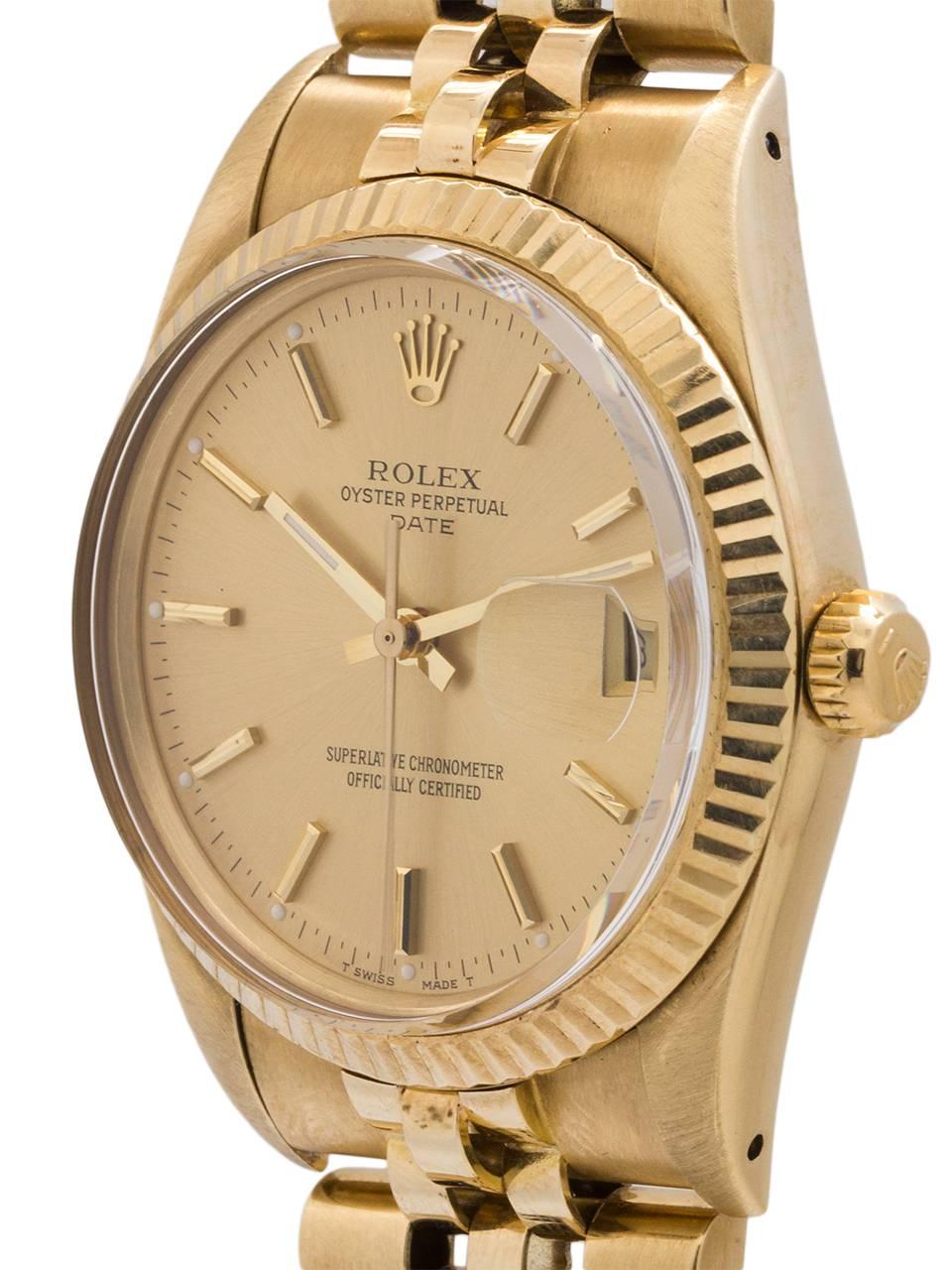 Rolex Yellow Gold Oyster Perpetual Date self winding Wristwatch, circa 1987 In Excellent Condition In West Hollywood, CA