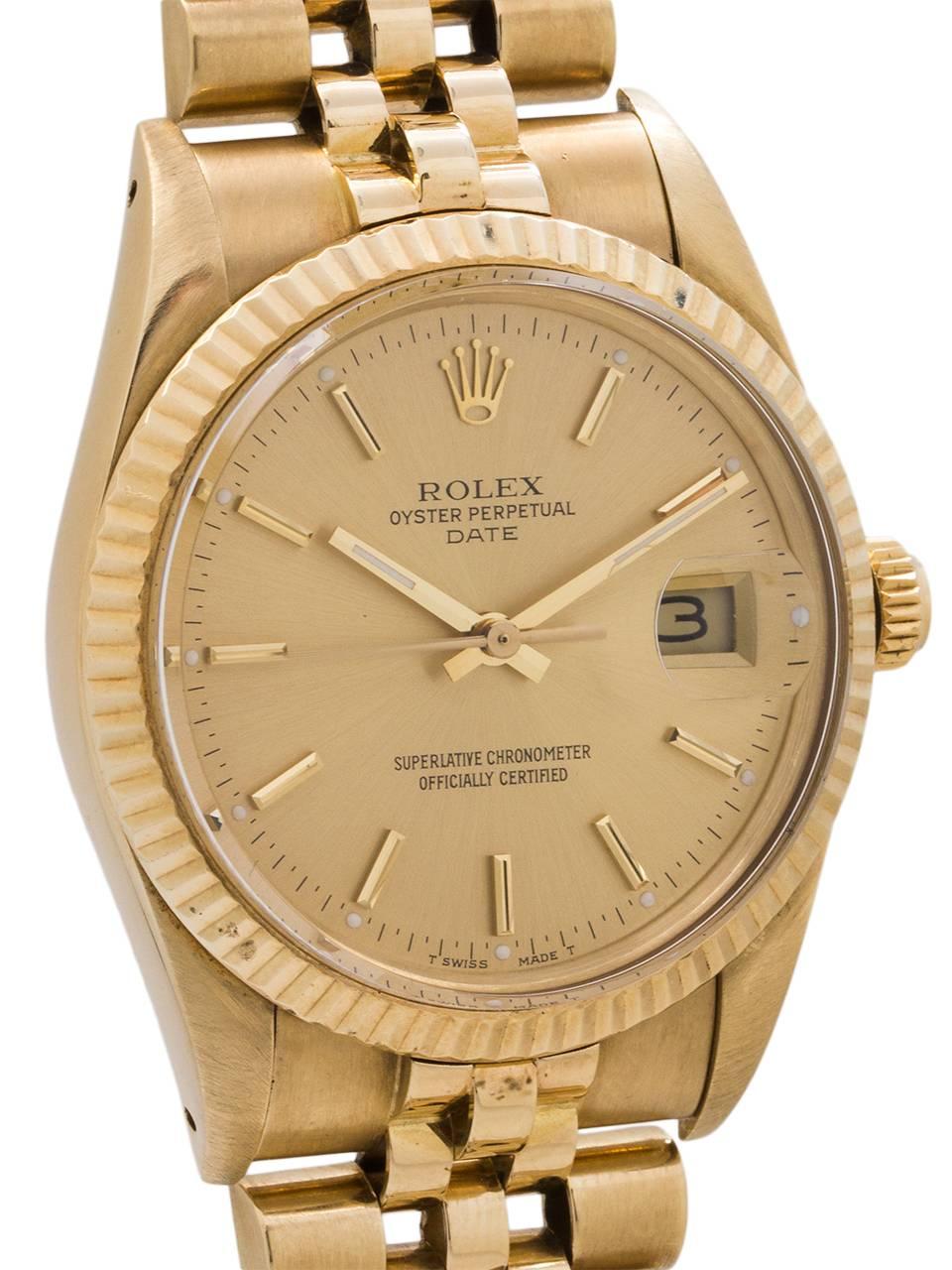 
Rolex Oyster Perpetual Date ref 15037 serial # 9.8 million circa 1987. Featuring a 34mm diameter case with fluted bezel, acrylic crystal, and original champagne dial with applied gold indexes and gilt baton hands. Powered by caliber 3035 self